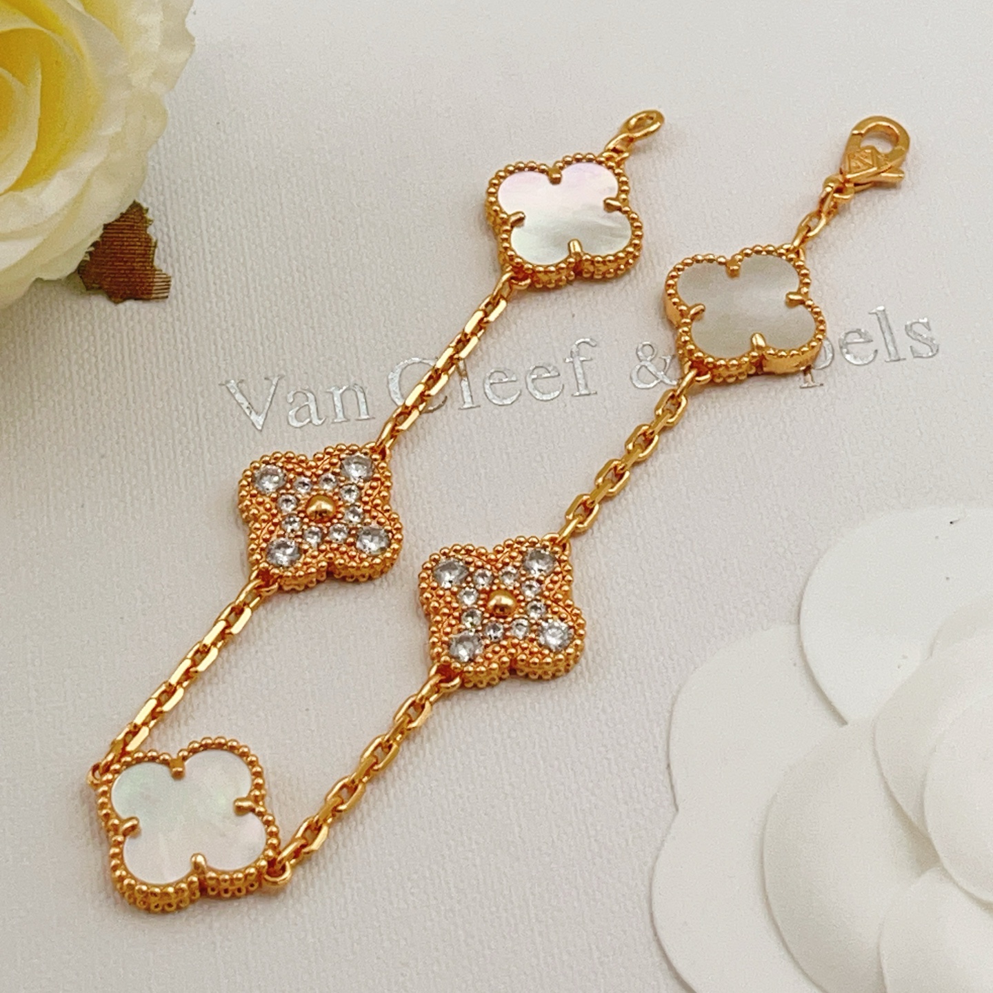 Van Cleef Arpels Alhambra bracelet Yellow gold with white mother-of-pearl and clear diamond accents 17cm