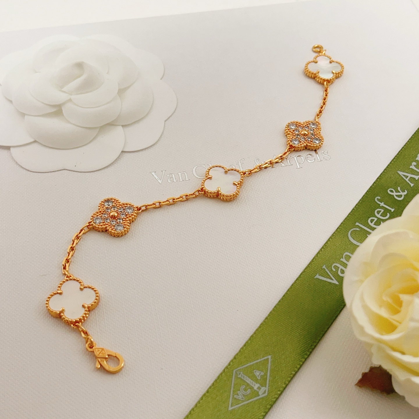 Van Cleef Arpels Alhambra bracelet Yellow gold with white mother-of-pearl and clear diamond accents 17cm