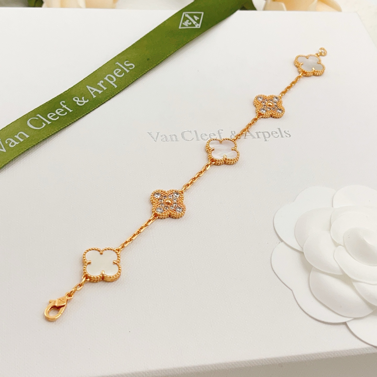 Van Cleef Arpels Alhambra bracelet Yellow gold with white mother-of-pearl and clear diamond accents 17cm
