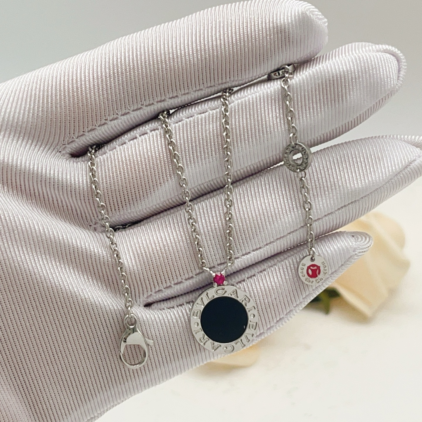 Bvlgari Bvlgari Bvlgari necklace silver-toned metal with black onyx inlay ruby accent and diamond-set pendant bezel 45cm