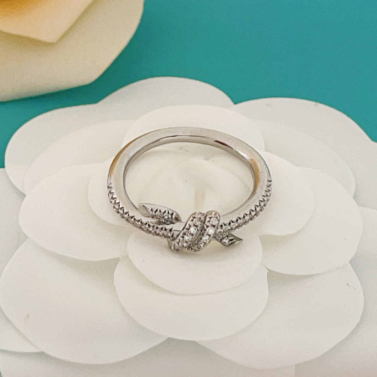 Tiffany Co Tiffany Knot ring silver-toned metal with clear pave diamonds 7