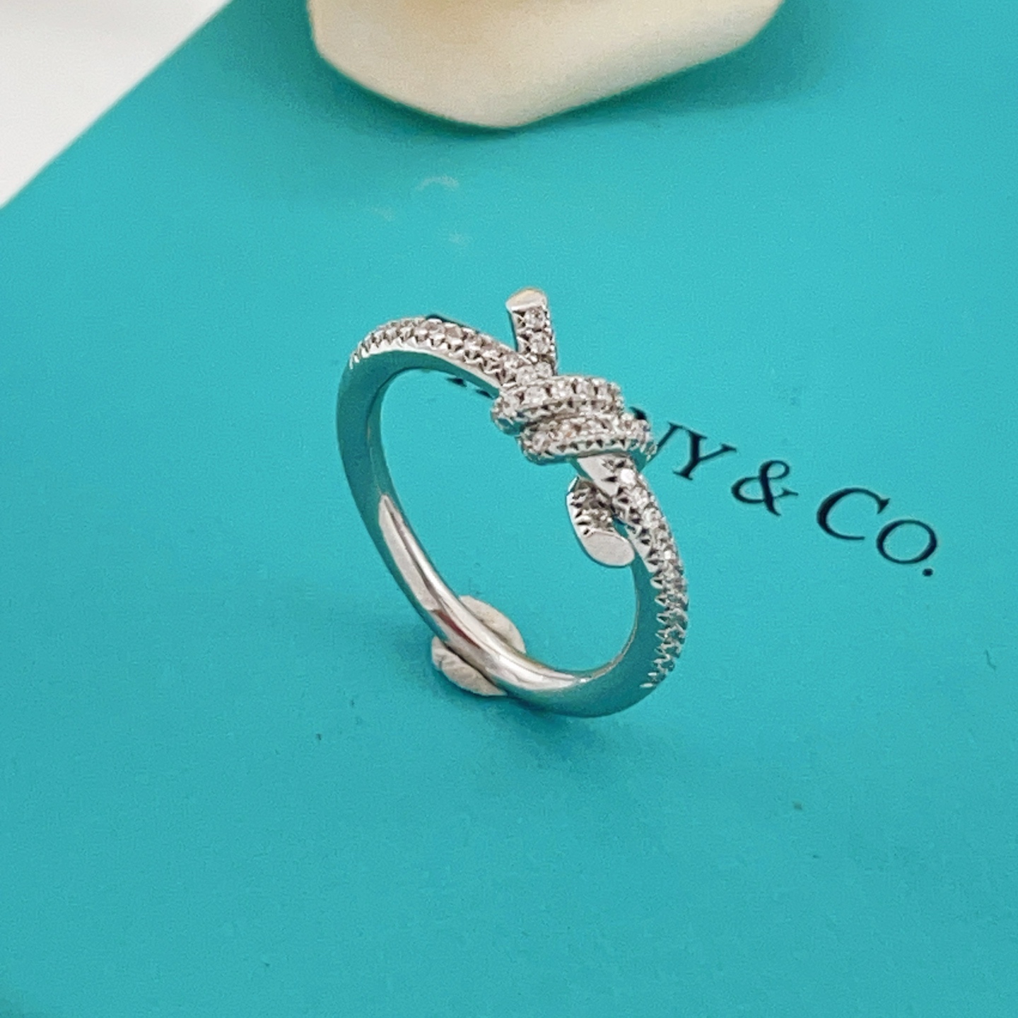 Tiffany Co Tiffany Knot ring silver-toned metal with clear pave diamonds 7