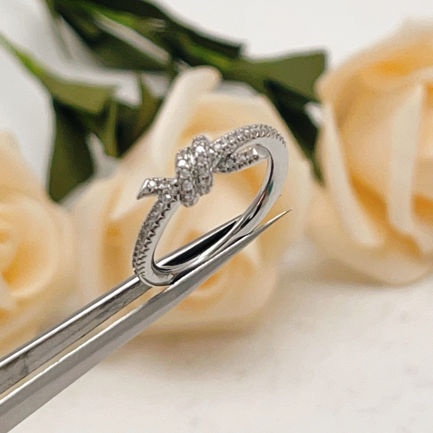 Tiffany Co Tiffany Knot ring silver-toned metal with clear pave diamonds 7