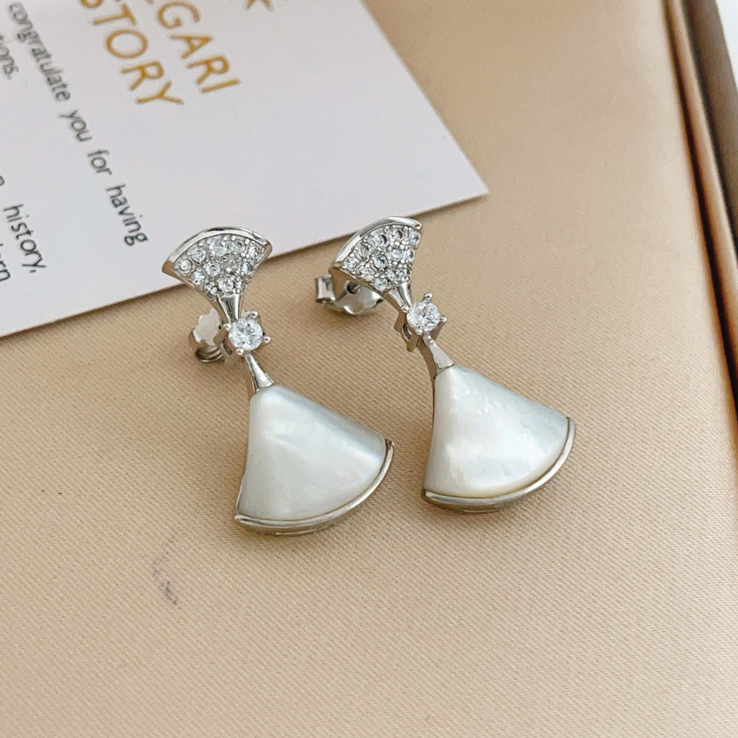 Bvlgari Divas Dream earrings silver-toned white gold clear diamond accents white mother-of-pearl 2 2cm drop length