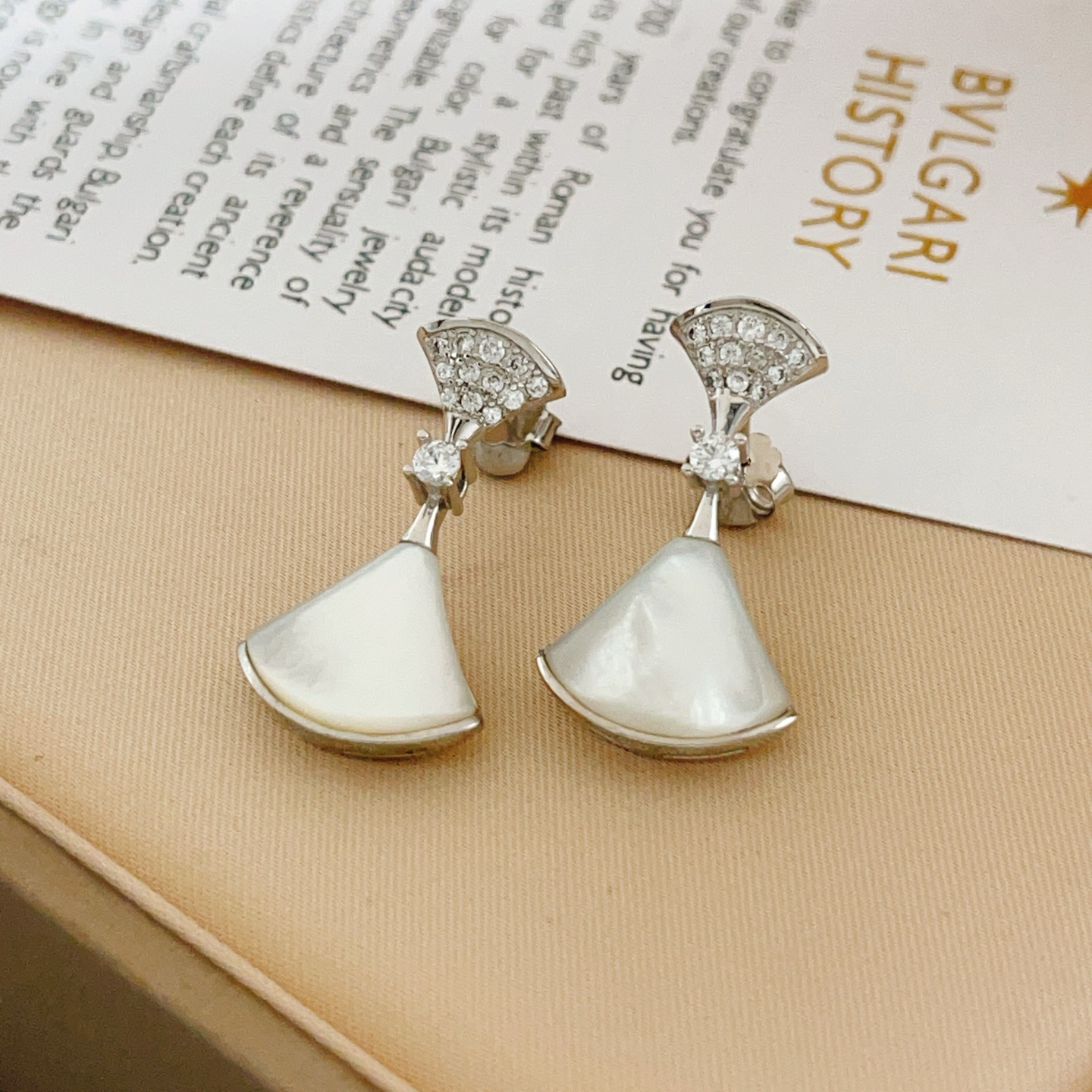 Bvlgari Divas Dream earrings silver-toned white gold clear diamond accents white mother-of-pearl 2 2cm drop length