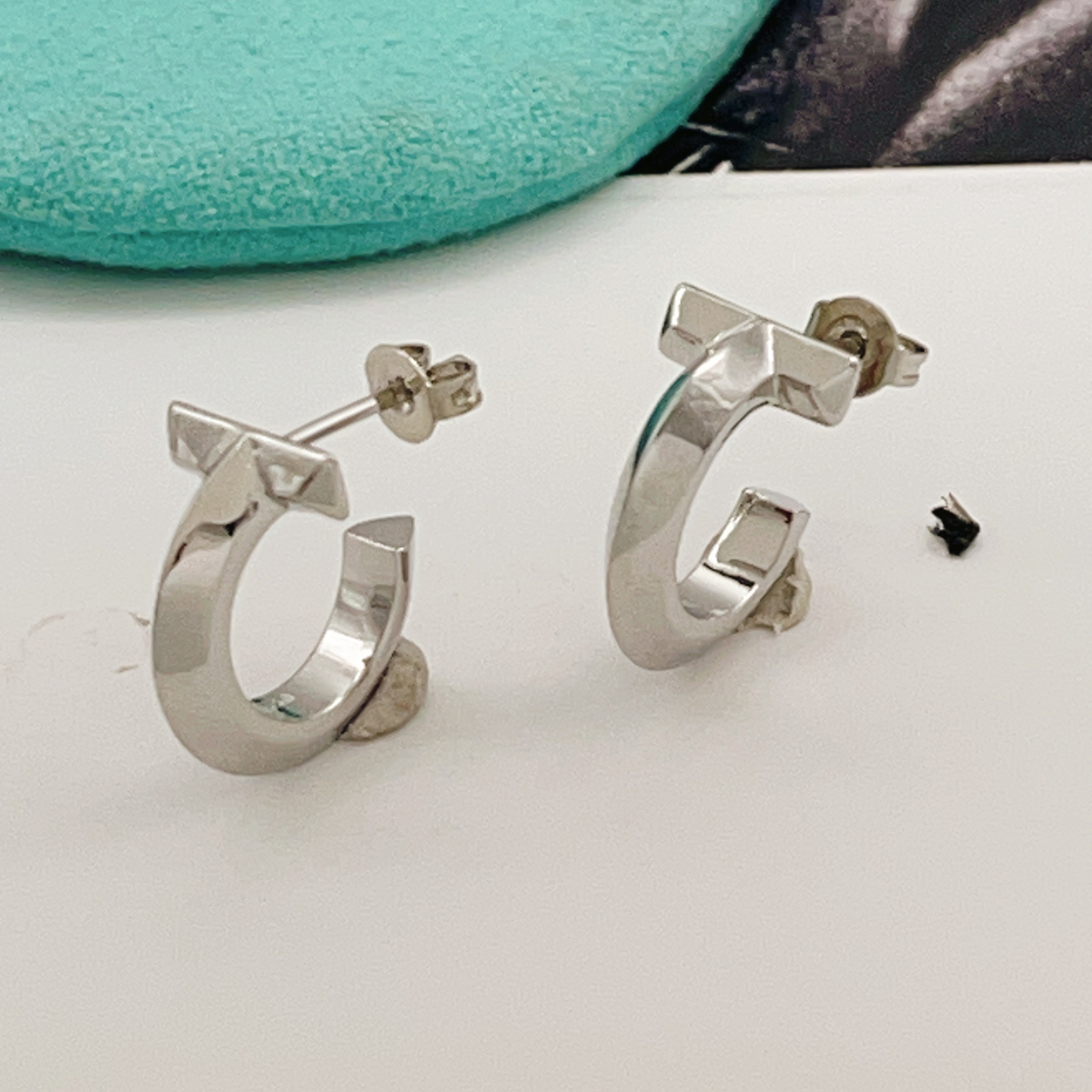 Tiffany T T1 earrings silver-toned metal no gemstones 15mm outer diameter