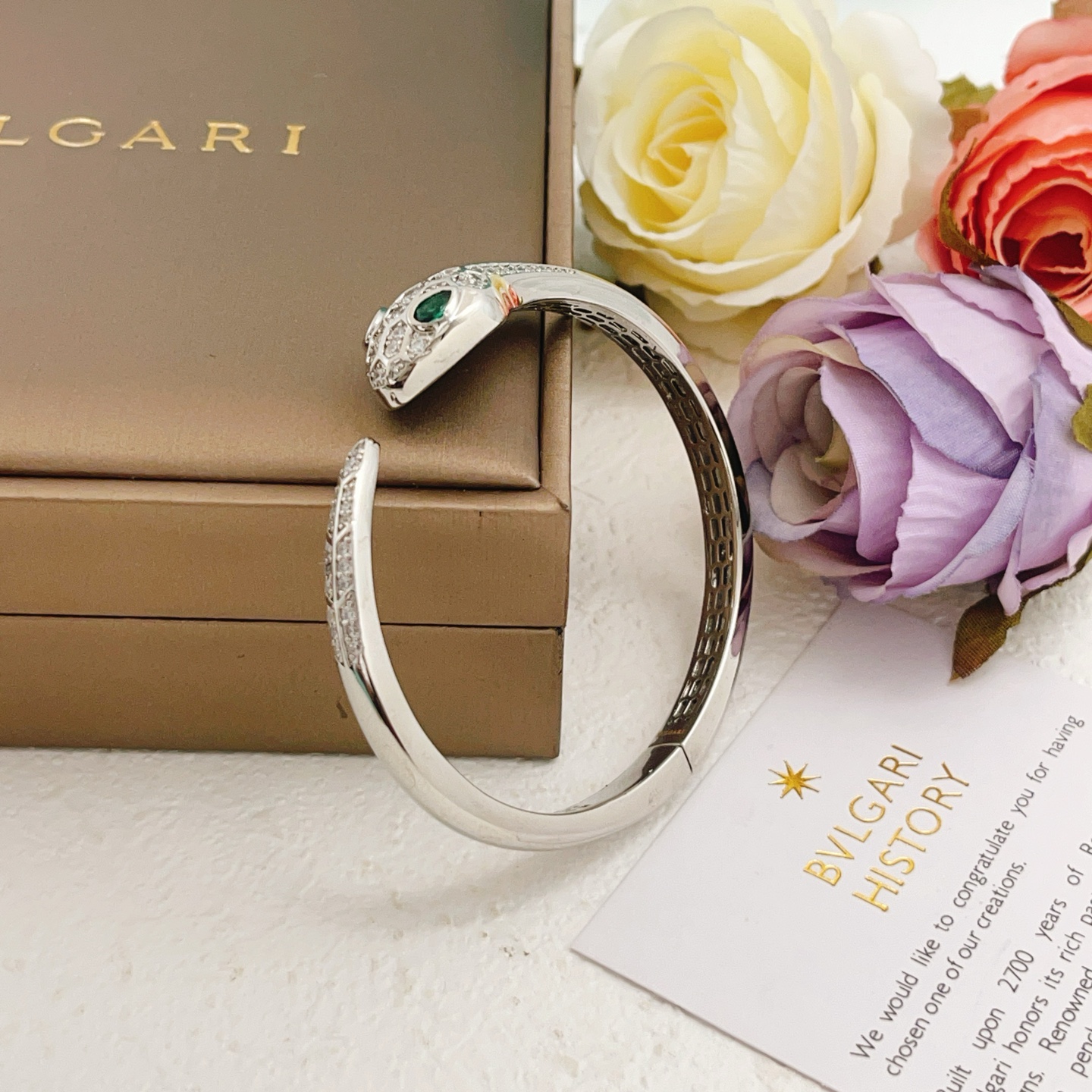Bvlgari Serpenti bracelet silver-toned white gold with clear pave diamonds and green malachite accents 17cm inner circumference