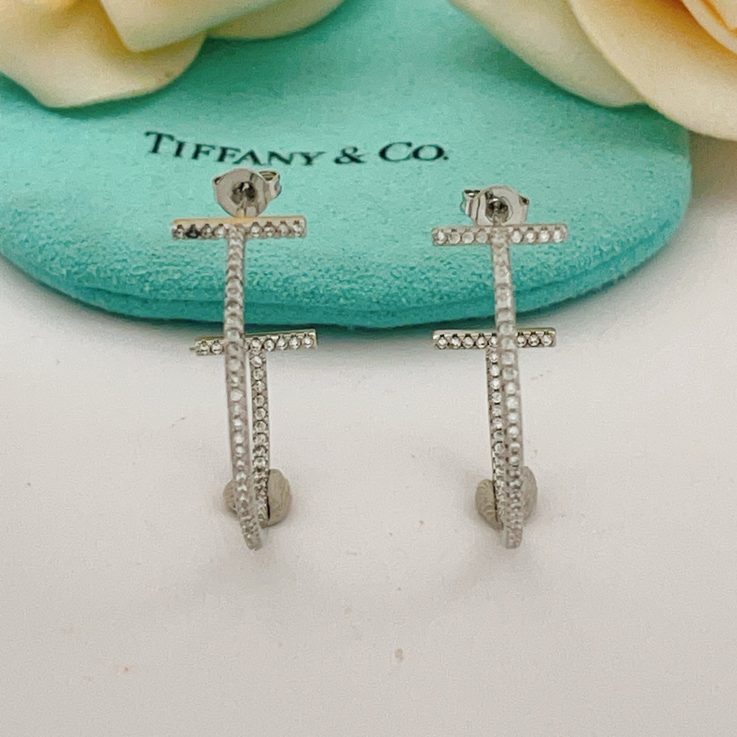 Tiffany Co T Wire Hoop earrings 18k white gold with pave diamonds 25mm hoop diameter