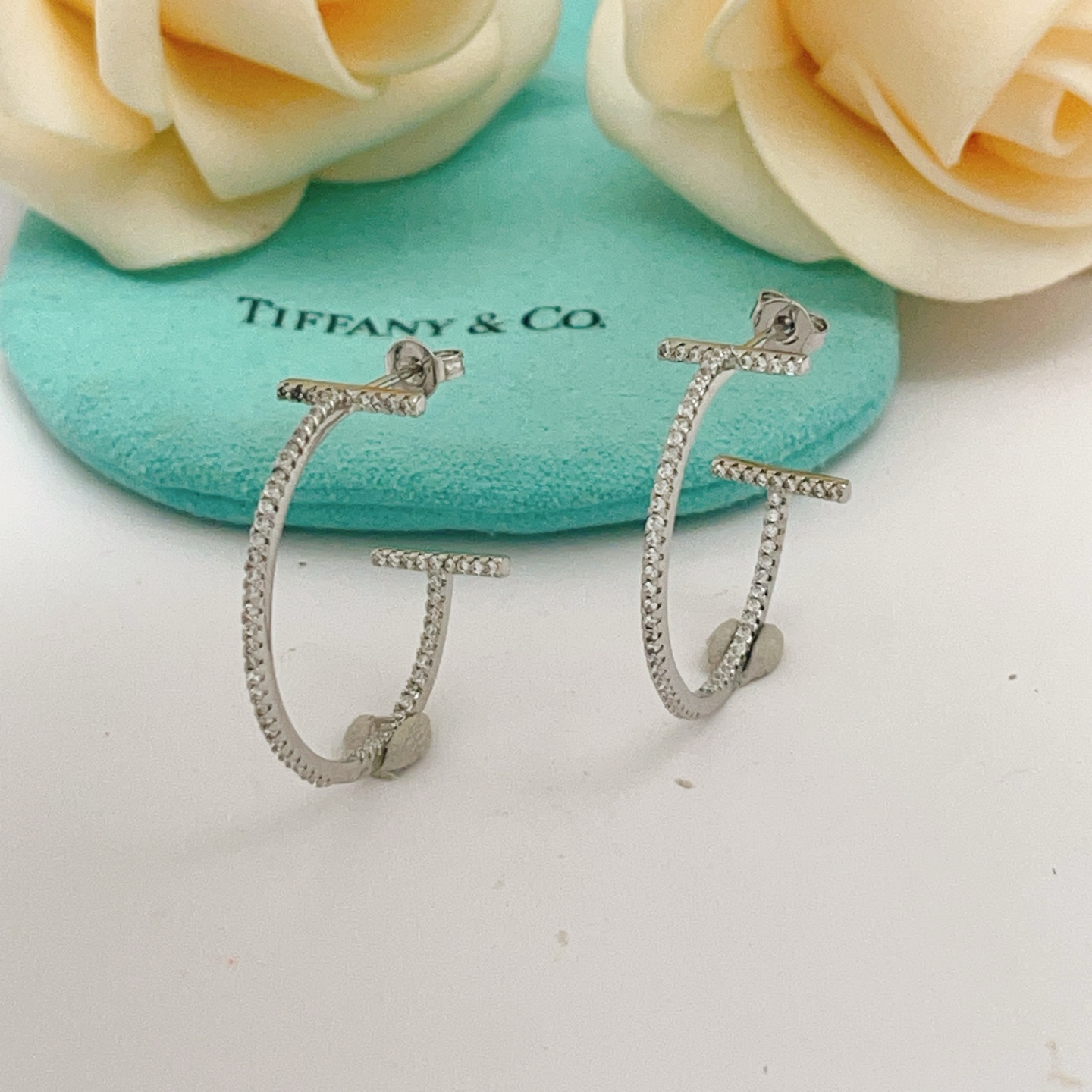 Tiffany Co T Wire Hoop earrings 18k white gold with pave diamonds 25mm hoop diameter