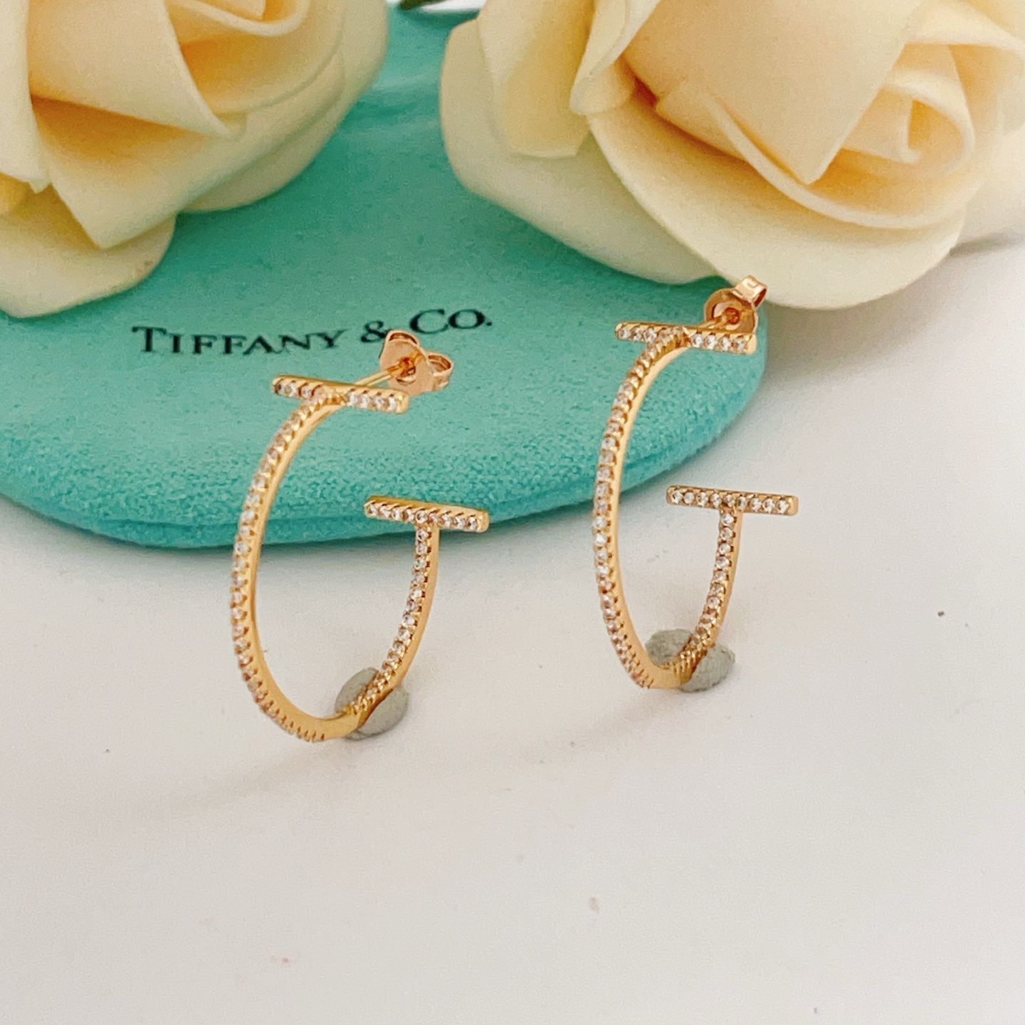 Tiffany Co T Wire Hoop earrings 18k yellow gold with pave set clear diamonds 30mm hoop diameter