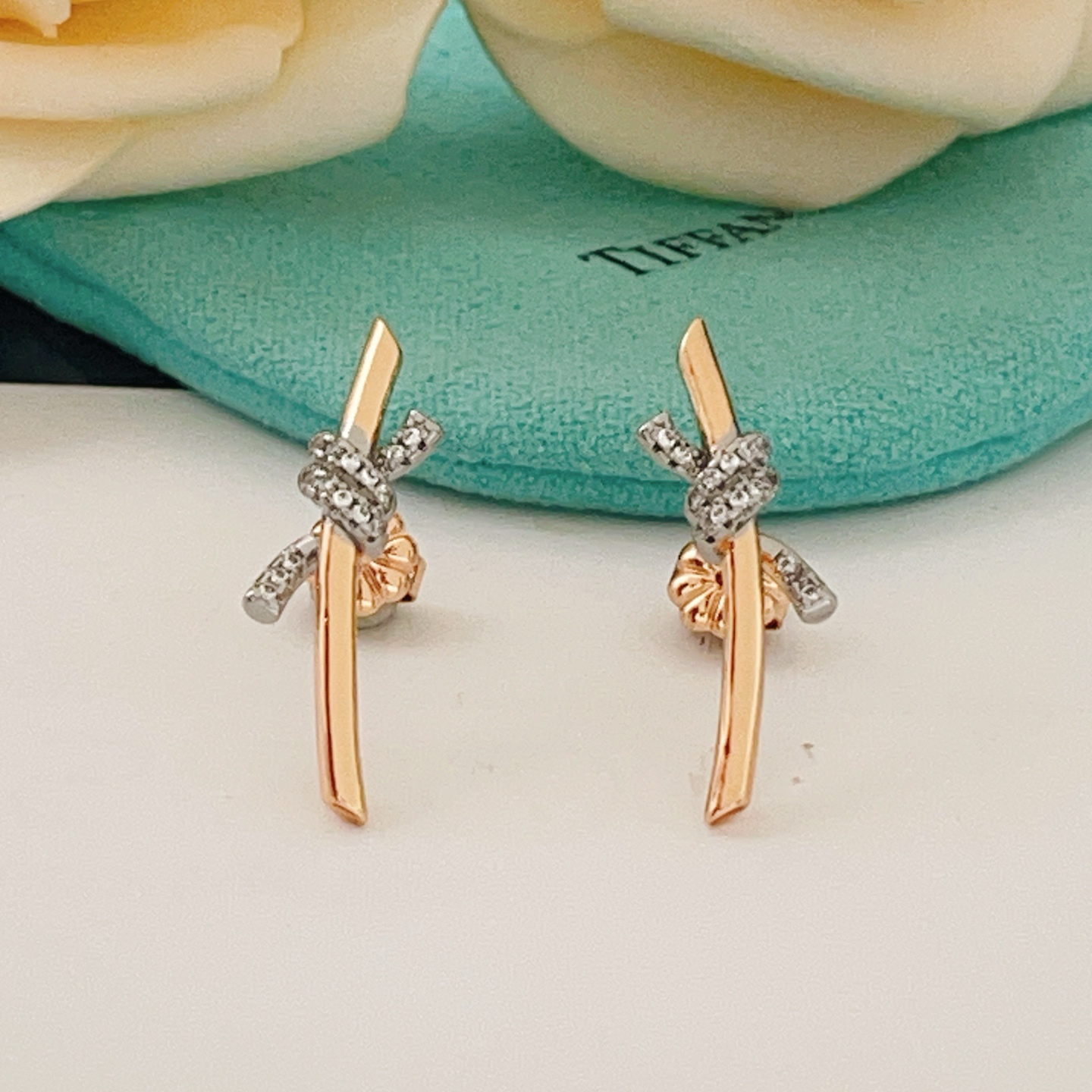 Tiffany Co Knot earrings 18k rose gold white gold with pave diamonds 20mm length