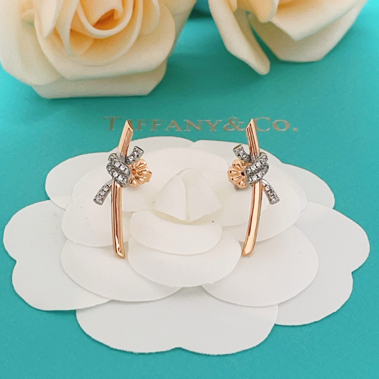 Tiffany Co Knot earrings 18k rose gold white gold with pave diamonds 20mm length