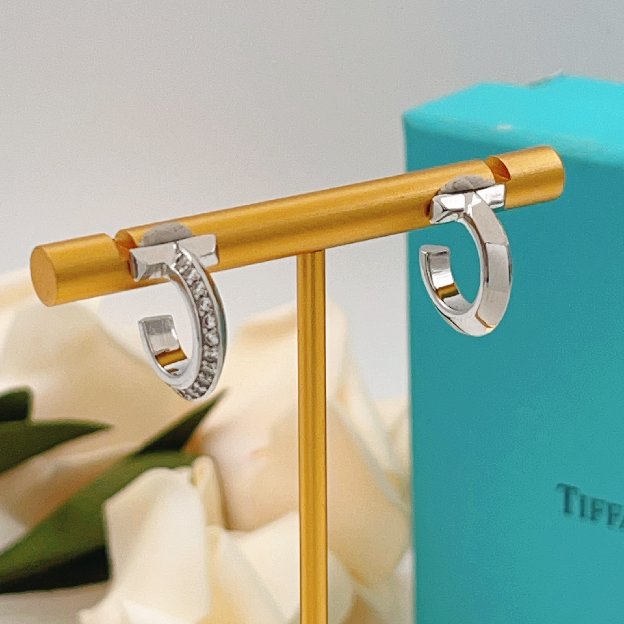 Tiffany T T1 earrings silver-toned metal with clear diamond accents 10mm hoop diameter
