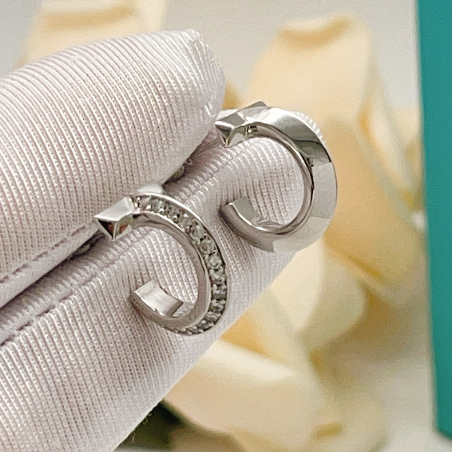 Tiffany T T1 earrings silver-toned metal with clear diamond accents 10mm hoop diameter