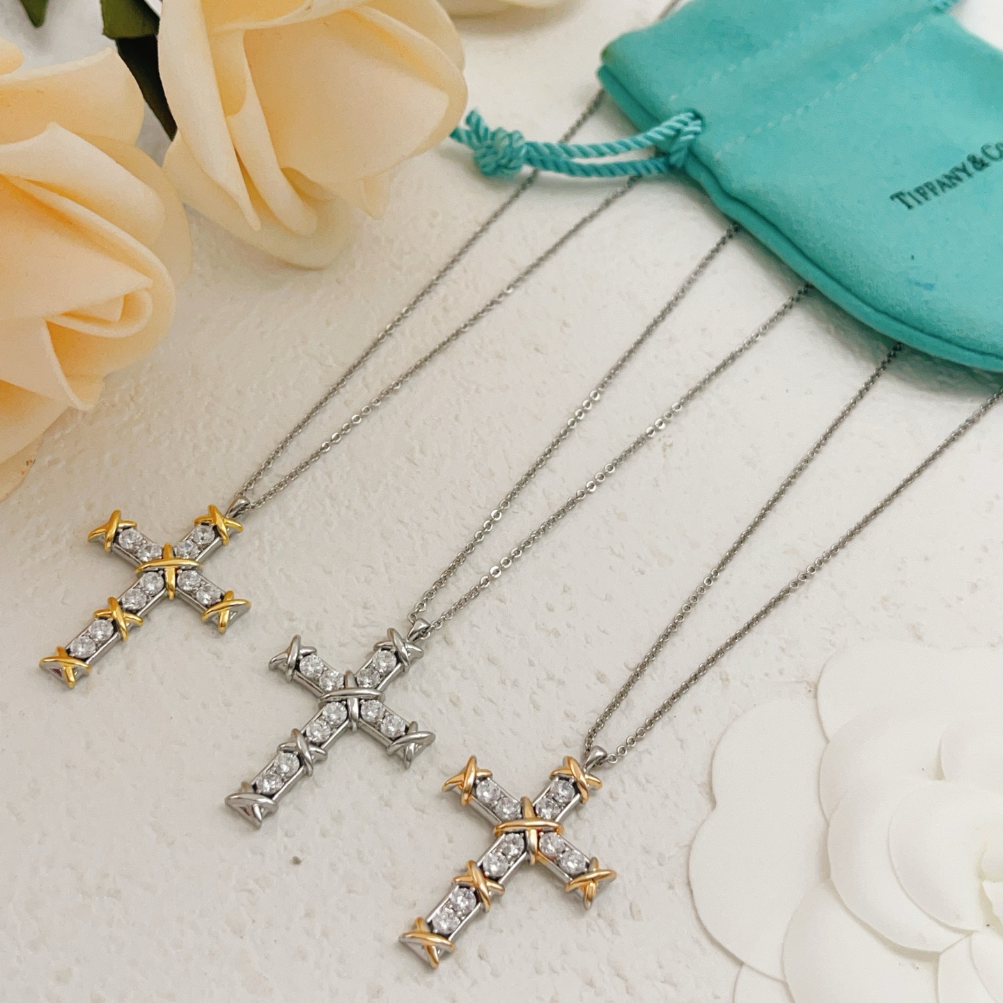 Tiffany Co Jean Schlumberger Cross Pendant necklace Sterling silver and 18k yellow gold with clear round diamonds 18 inches