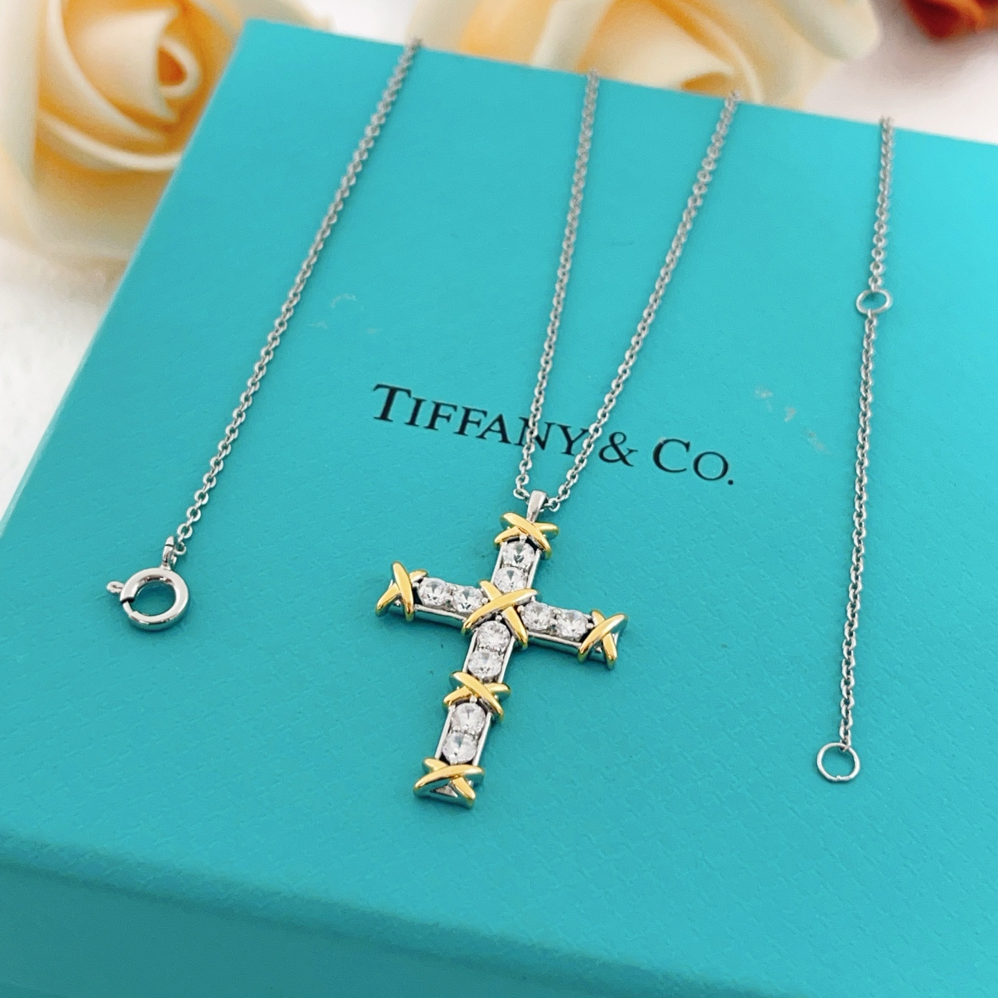 Tiffany Co Jean Schlumberger Cross Pendant necklace Sterling silver and 18k yellow gold with clear round diamonds 18 inches