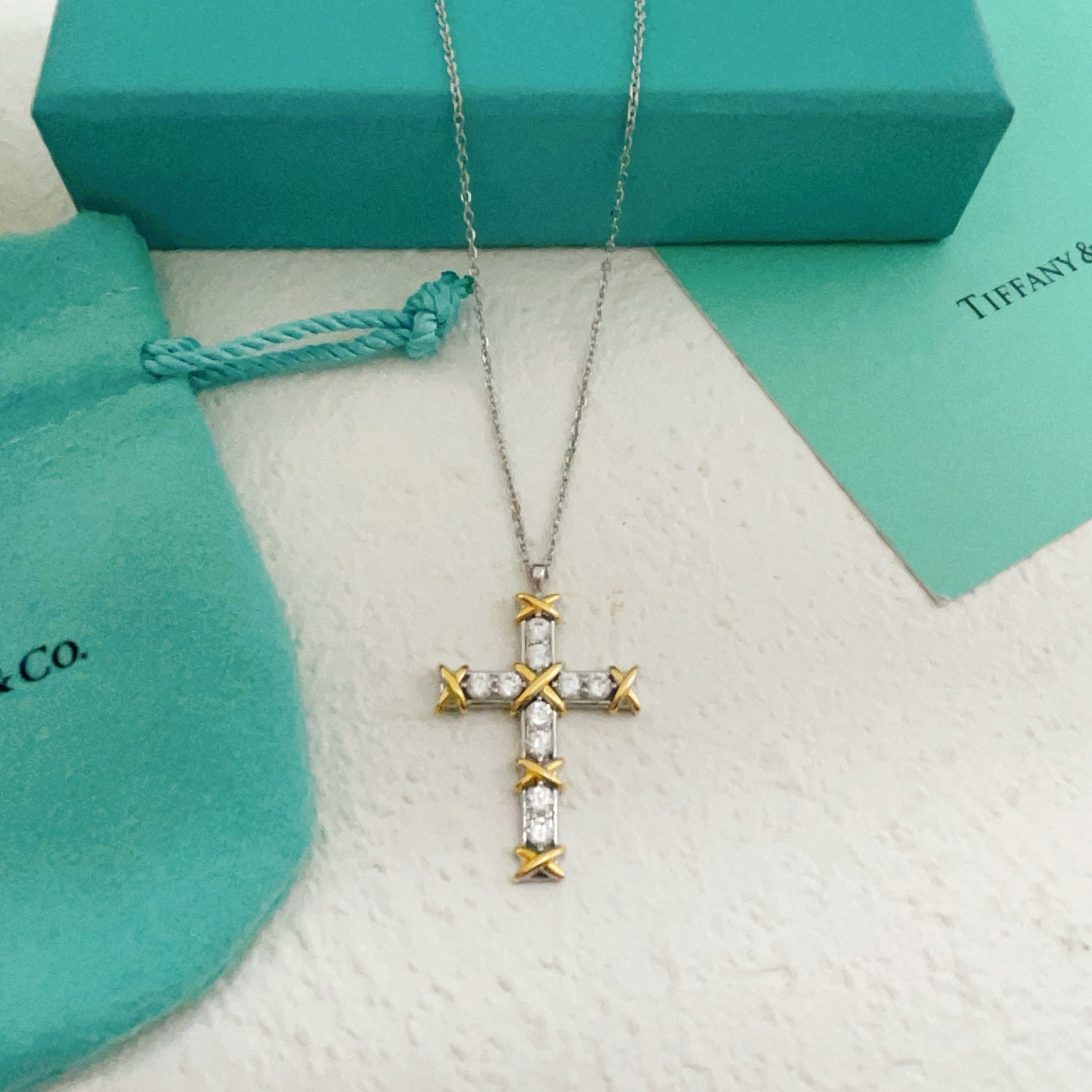 Tiffany Co Jean Schlumberger Cross Pendant necklace Sterling silver and 18k yellow gold with clear round diamonds 18 inches
