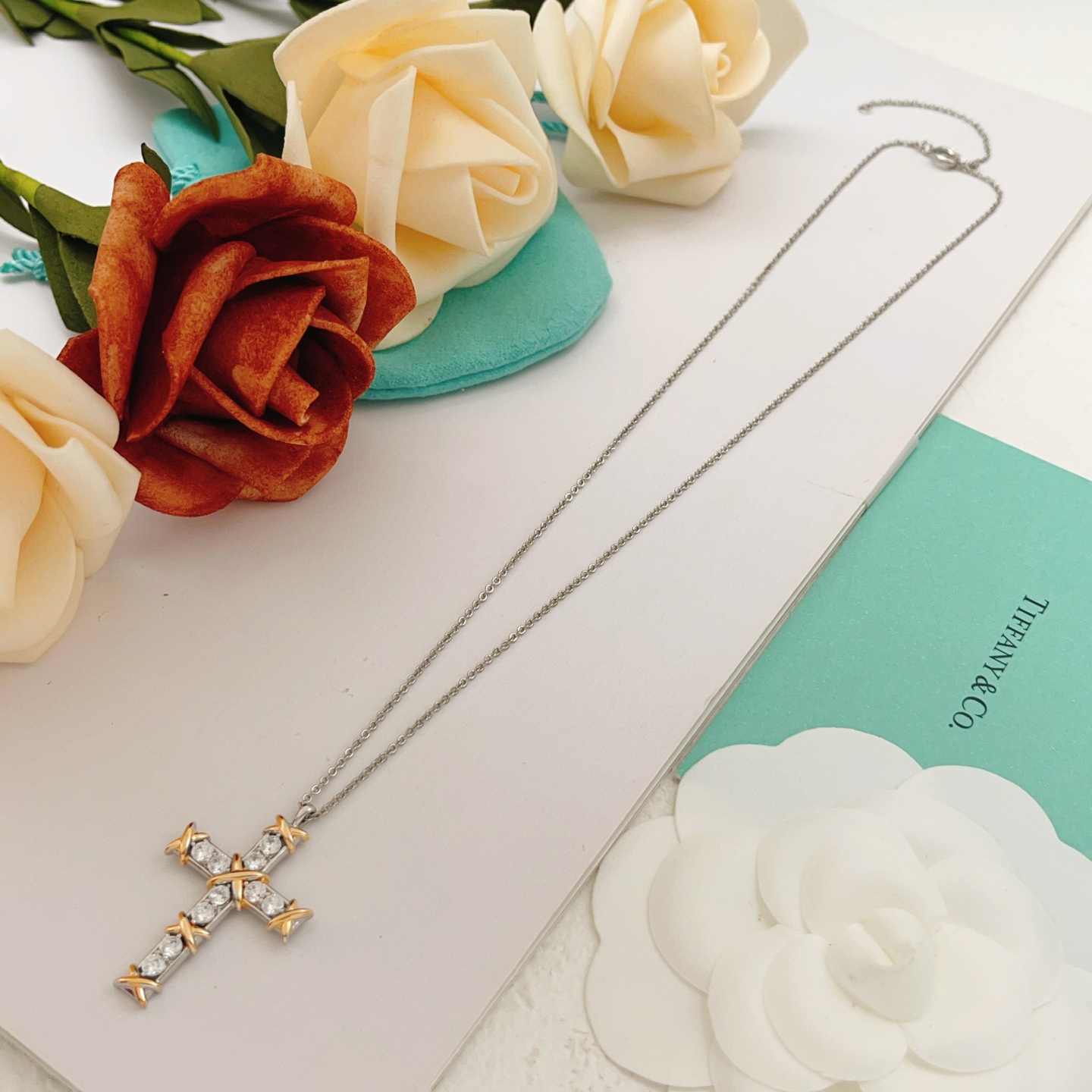 Tiffany Co Jean Schlumberger Cross Pendant necklace Two-tone silver and yellow gold with clear diamond stones 18 inches