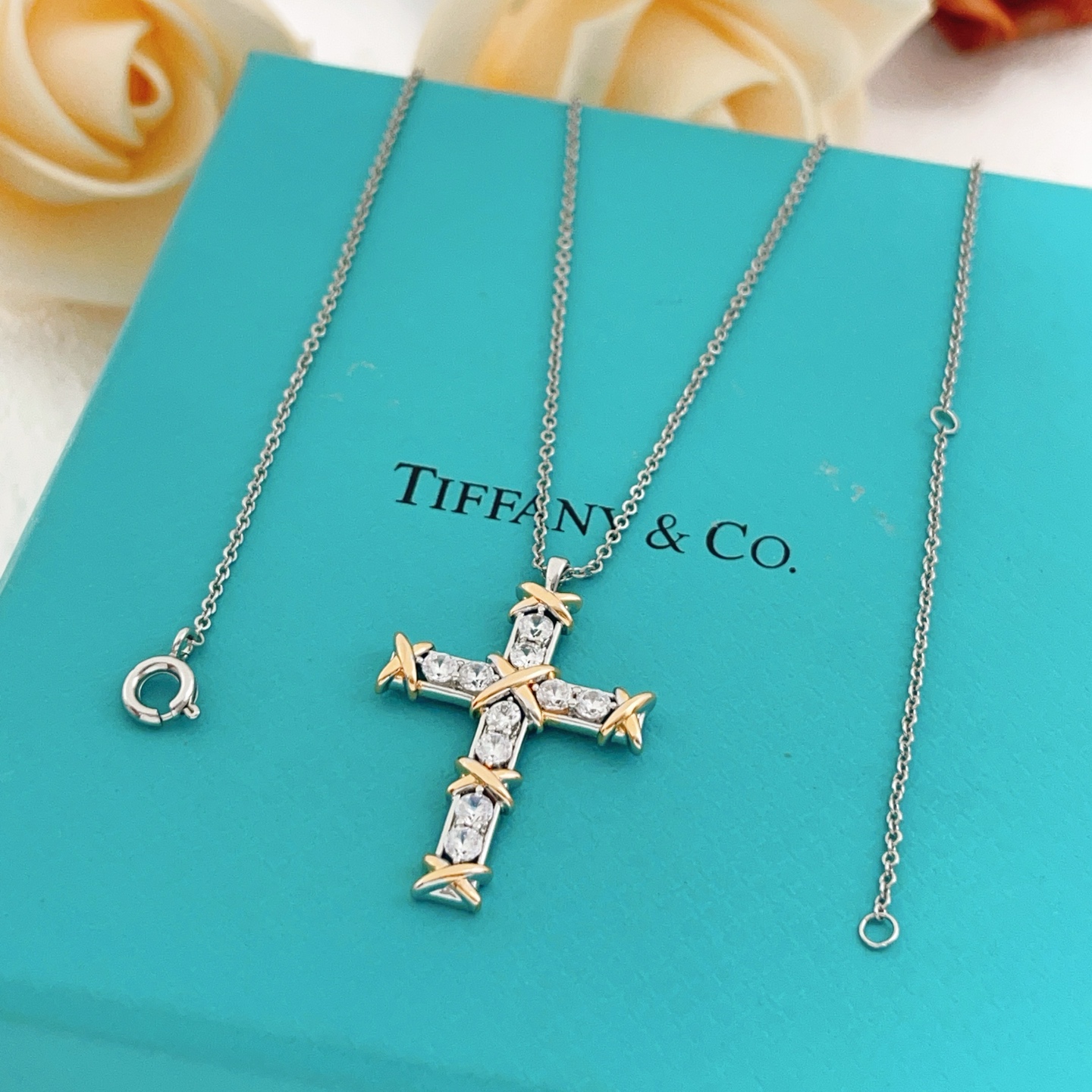 Tiffany Co Jean Schlumberger Cross Pendant necklace Two-tone silver and yellow gold with clear diamond stones 18 inches