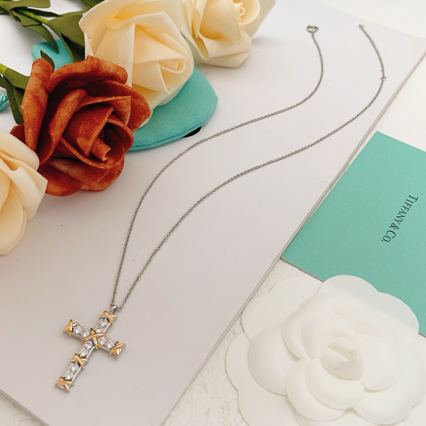 Tiffany Co Jean Schlumberger Cross Pendant necklace Two-tone silver and yellow gold with clear diamond stones 18 inches