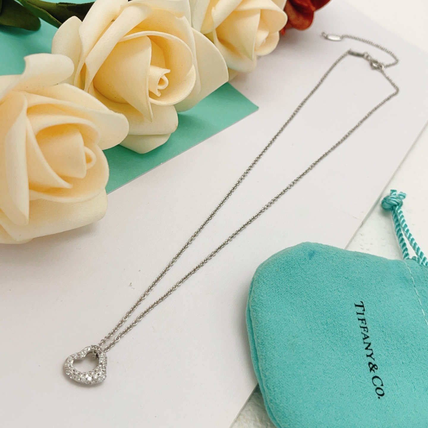 Tiffany Co Open Heart necklace sterling silver with clear diamond accents 16 inches