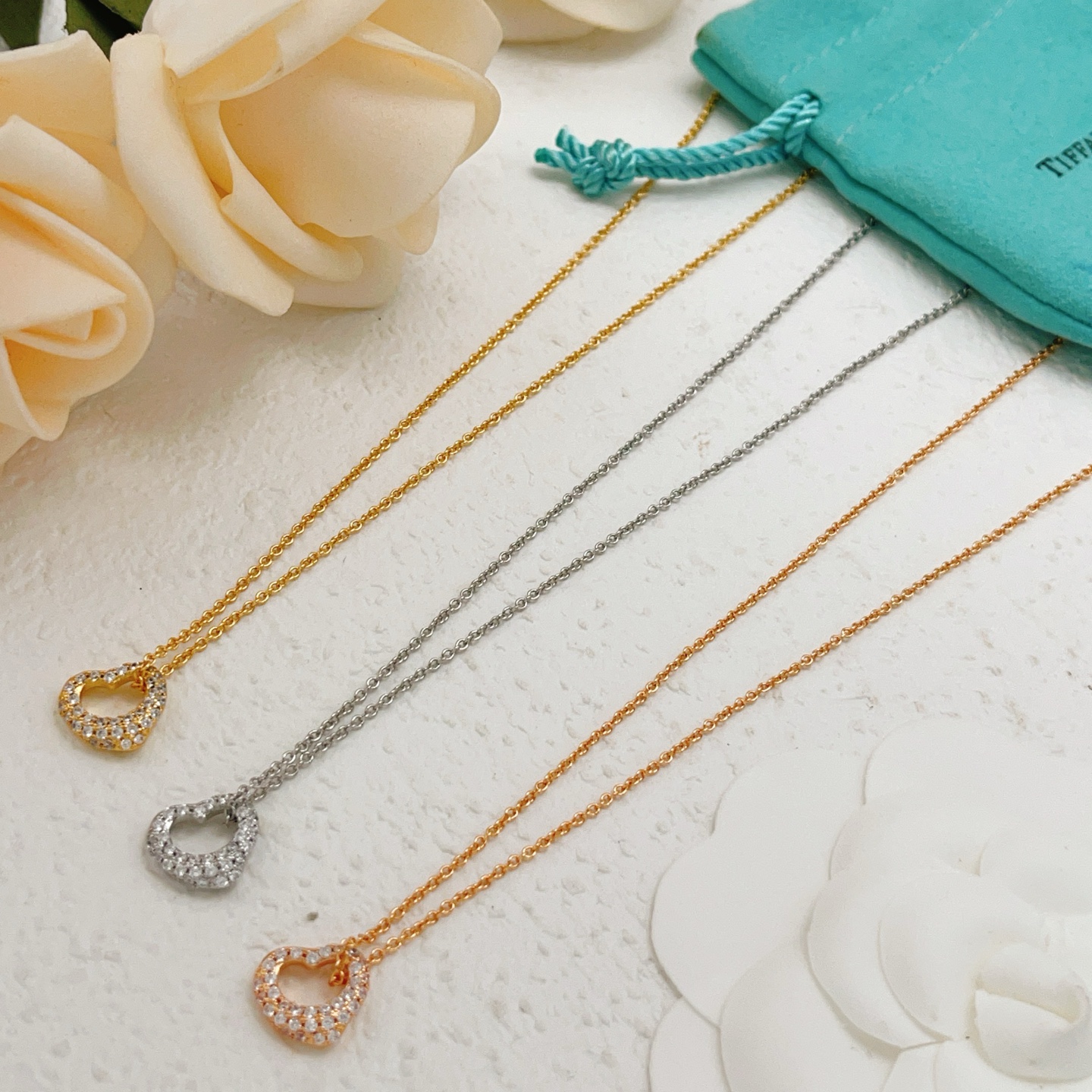 Tiffany Co Open Heart necklace 18k rose gold 18k yellow gold sterling silver with clear diamond accents 16 inches