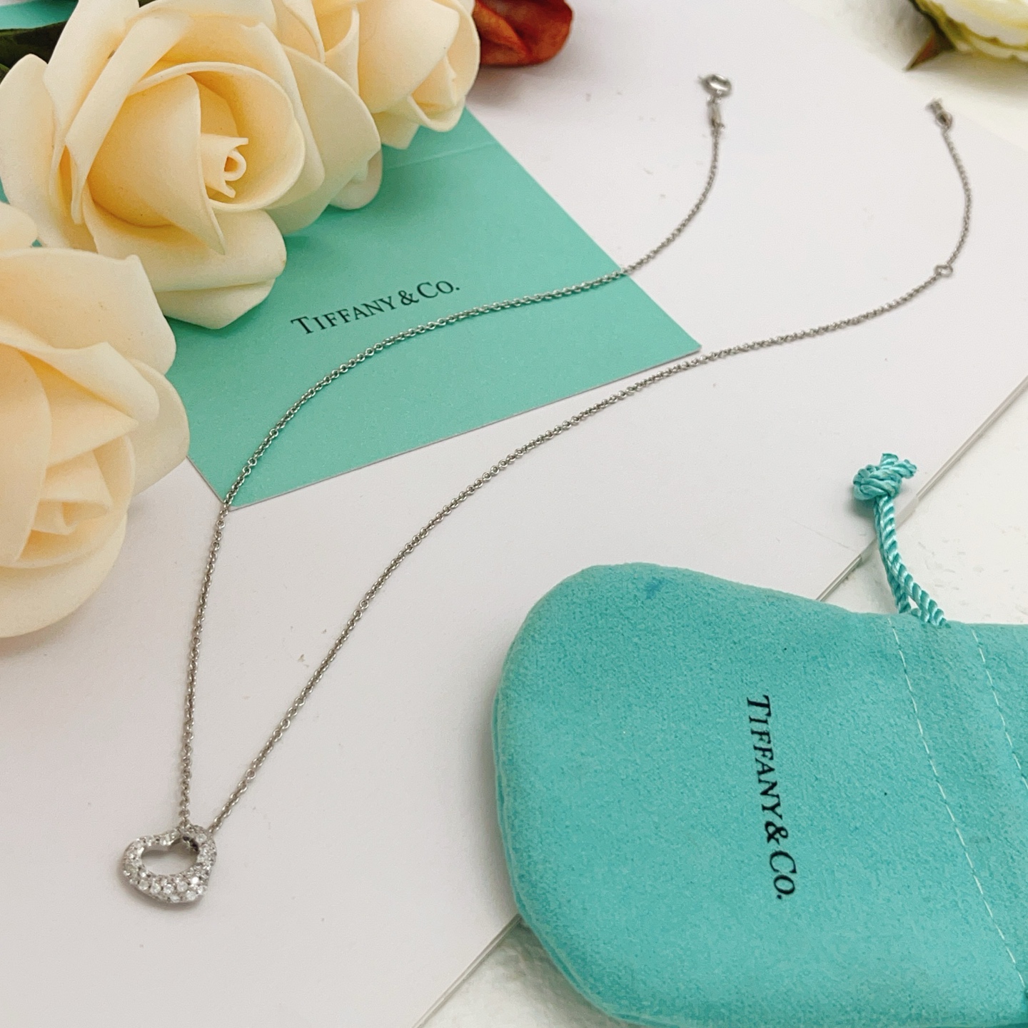 Tiffany Co Open Heart necklace sterling silver with clear diamond accents 16 inches
