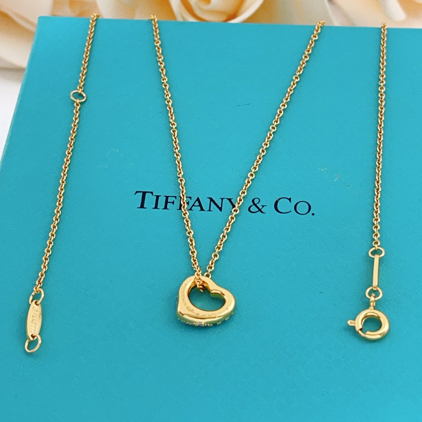 Tiffany Co Open Heart necklace yellow gold with clear diamond accents 16 inches