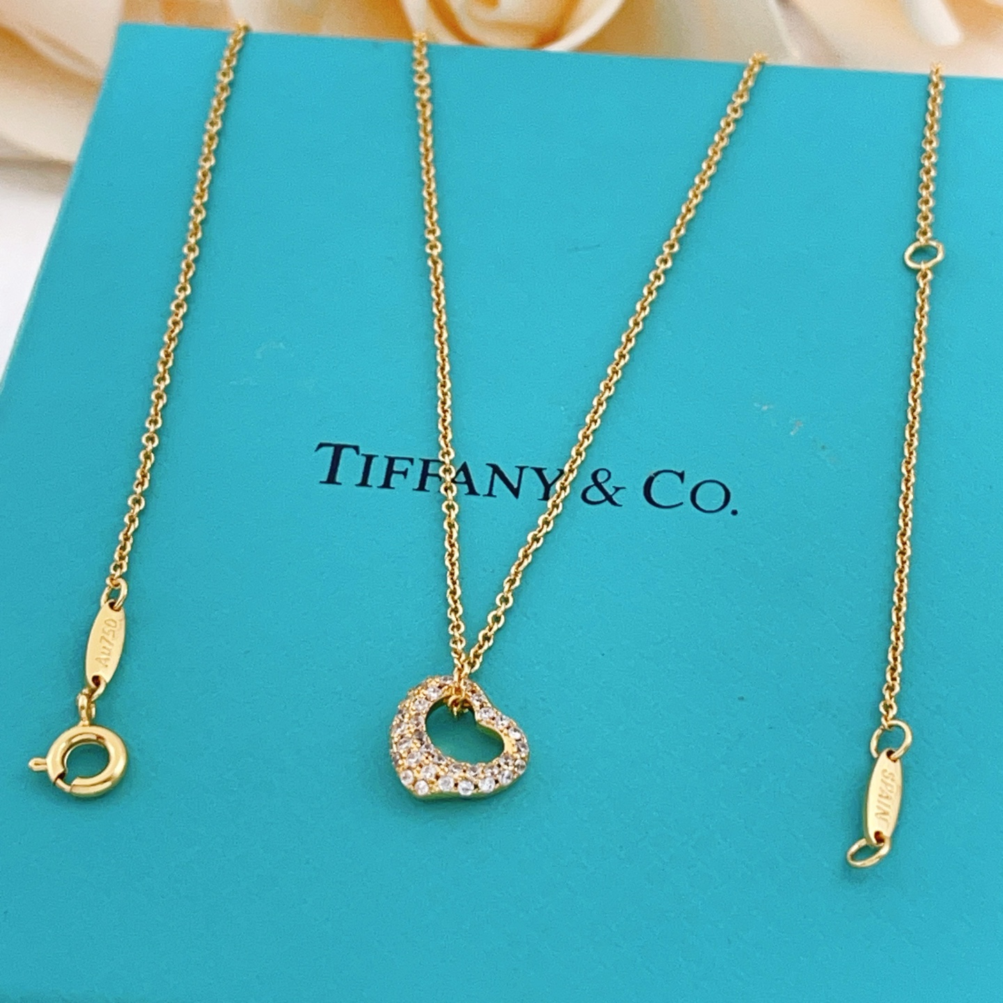 Tiffany Co Open Heart necklace yellow gold with clear diamond accents 16 inches