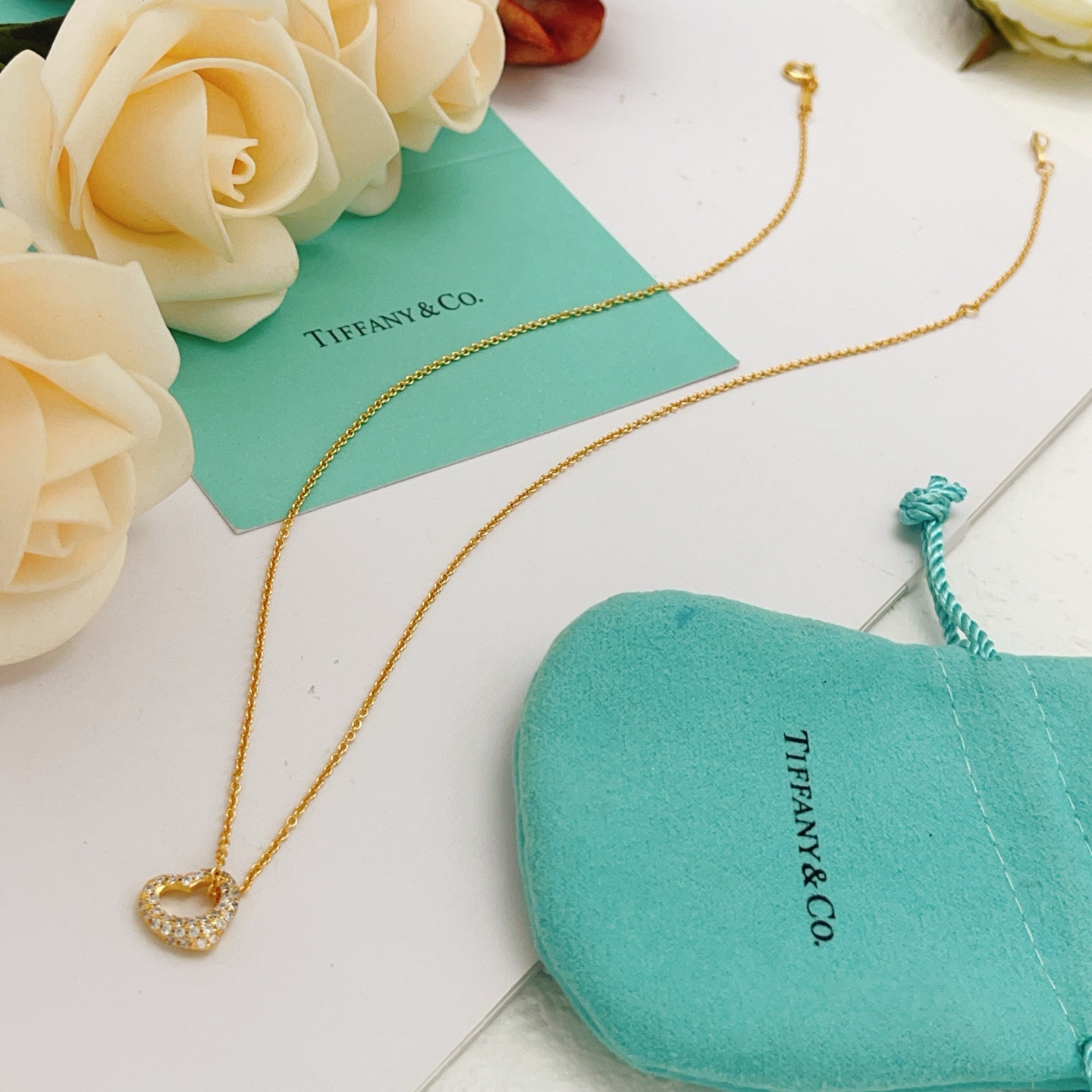 Tiffany Co Open Heart necklace yellow gold with clear diamond accents 16 inches