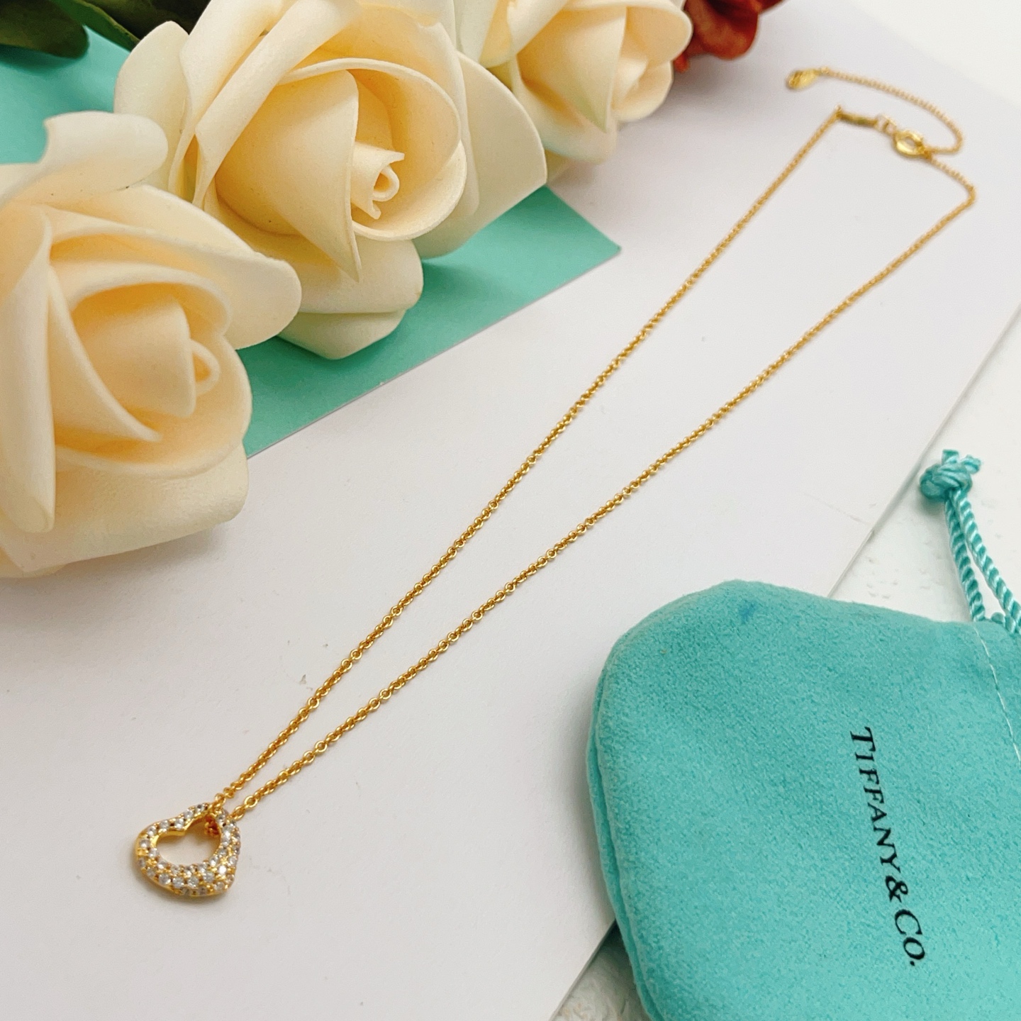 Tiffany Co Open Heart necklace yellow gold with clear diamond accents 16 inches