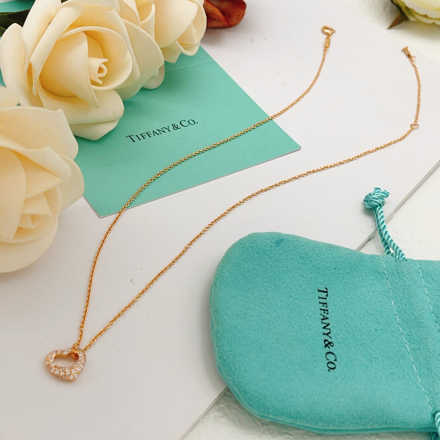 Tiffany Co Open Heart necklace 18k rose gold 18k yellow gold sterling silver with clear diamond accents 16 inches