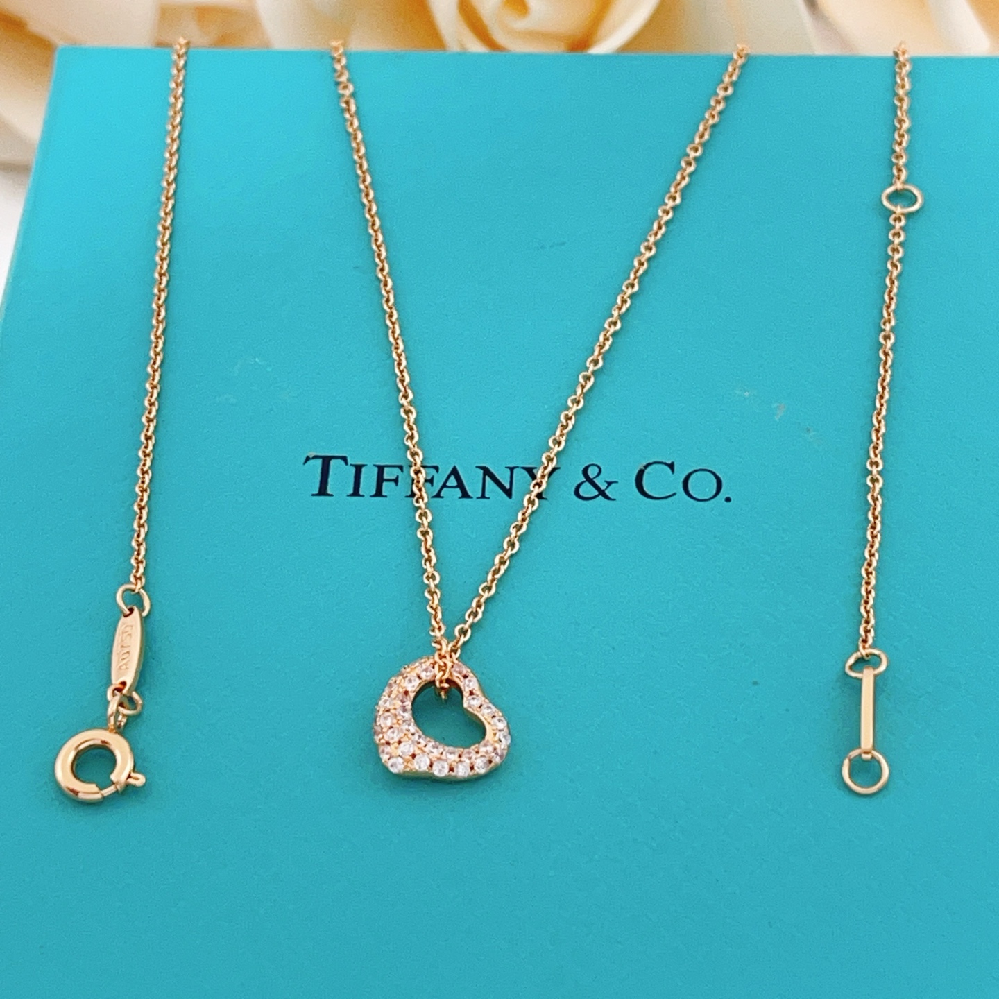 Tiffany Co Open Heart necklace 18k rose gold 18k yellow gold sterling silver with clear diamond accents 16 inches
