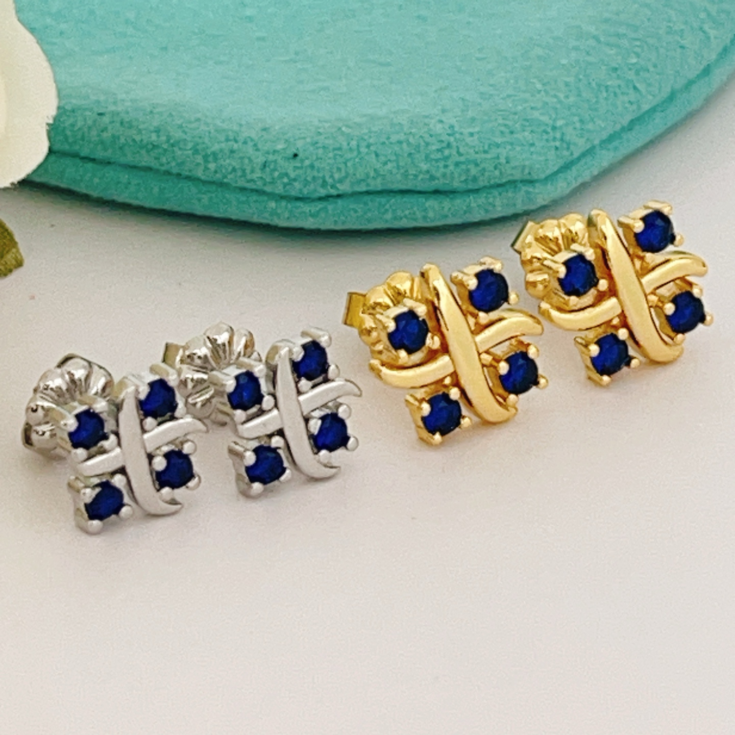 Tiffany Signature X earrings yellow gold with blue sapphire stones 8mm stud diameter