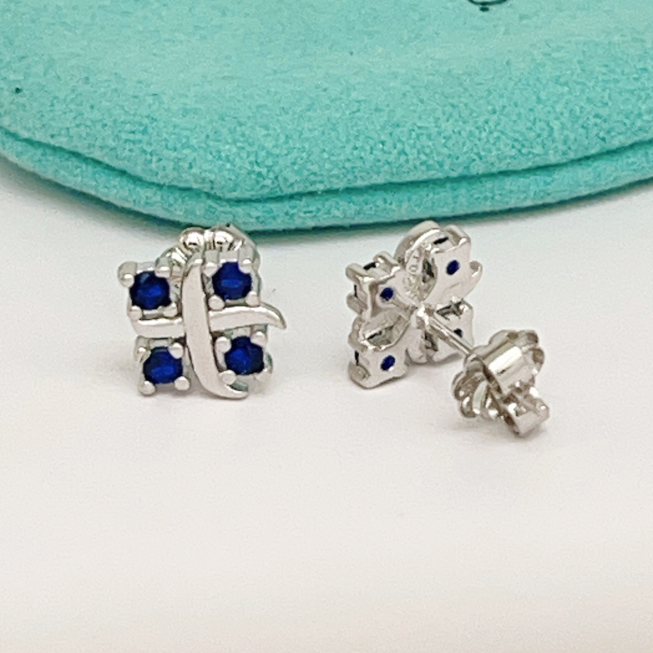 Tiffany Tiffany T earrings sterling silver with deep blue sapphire stones 8mm stud diameter