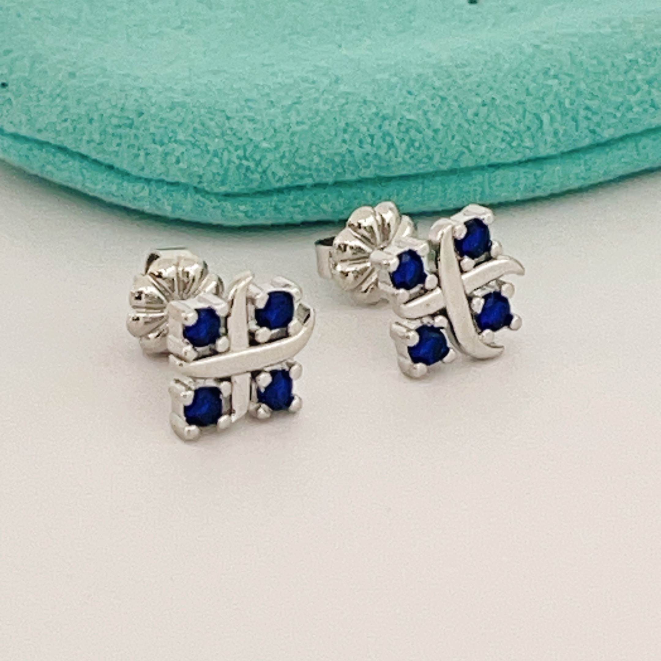 Tiffany Tiffany T earrings sterling silver with deep blue sapphire stones 8mm stud diameter