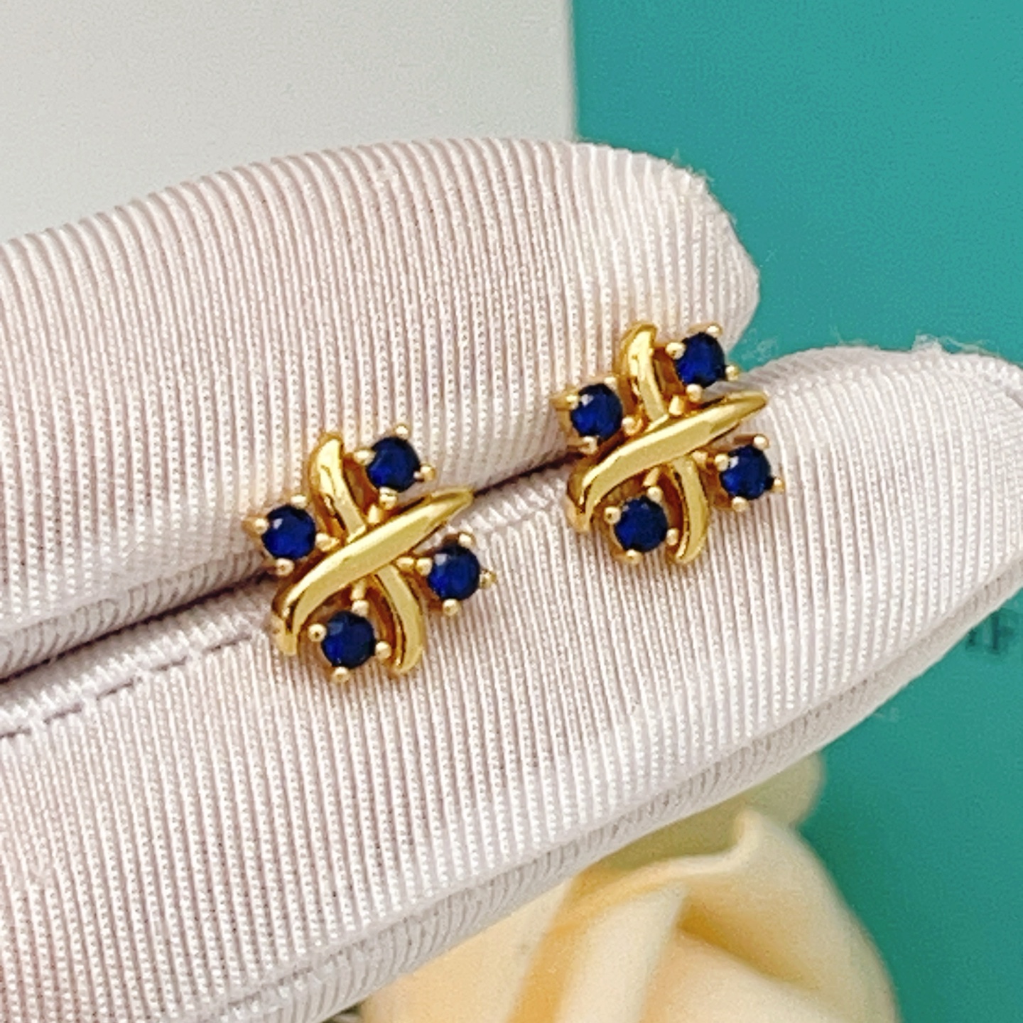 Tiffany Signature X earrings yellow gold with blue sapphire stones 8mm stud diameter