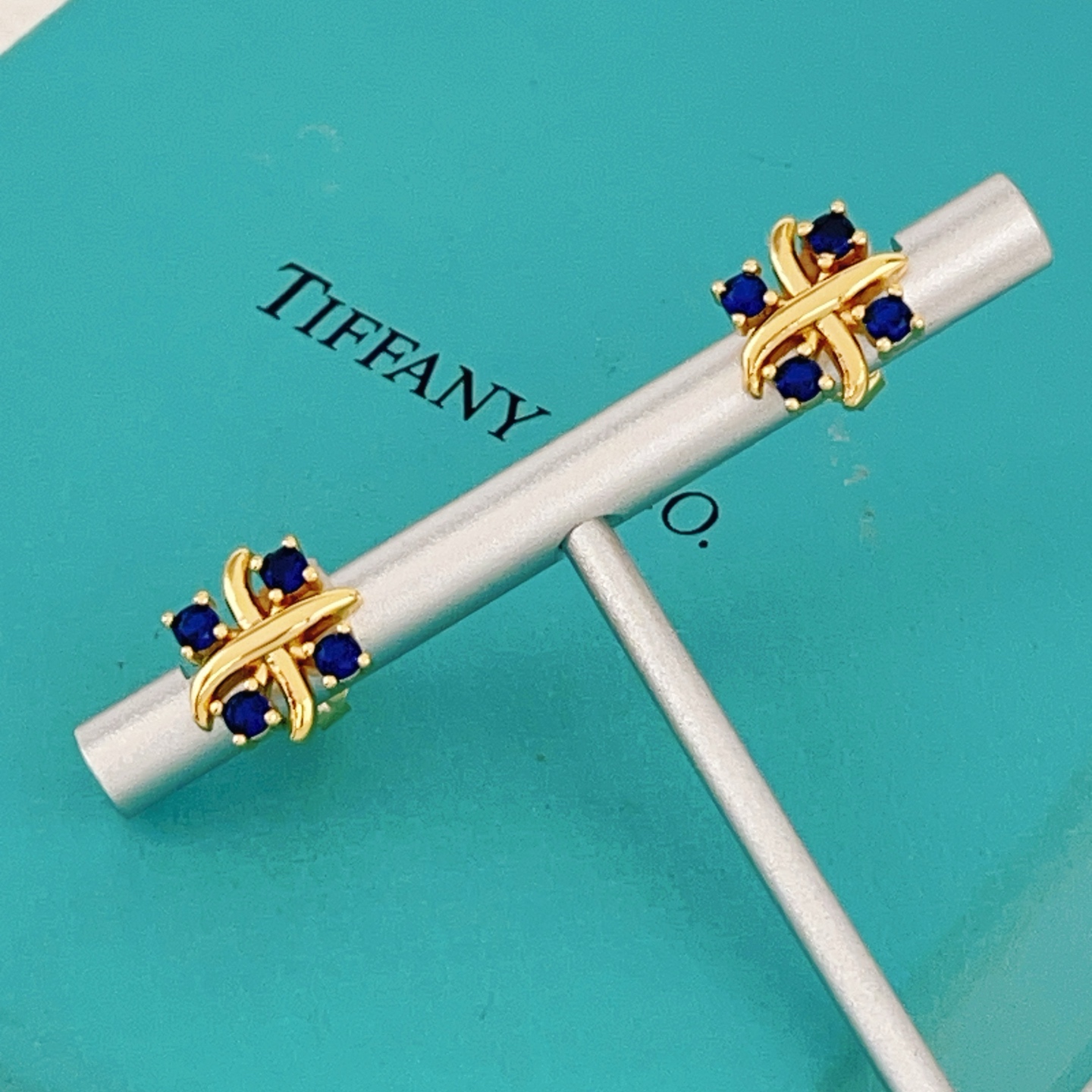 Tiffany Signature X earrings yellow gold with blue sapphire stones 8mm stud diameter