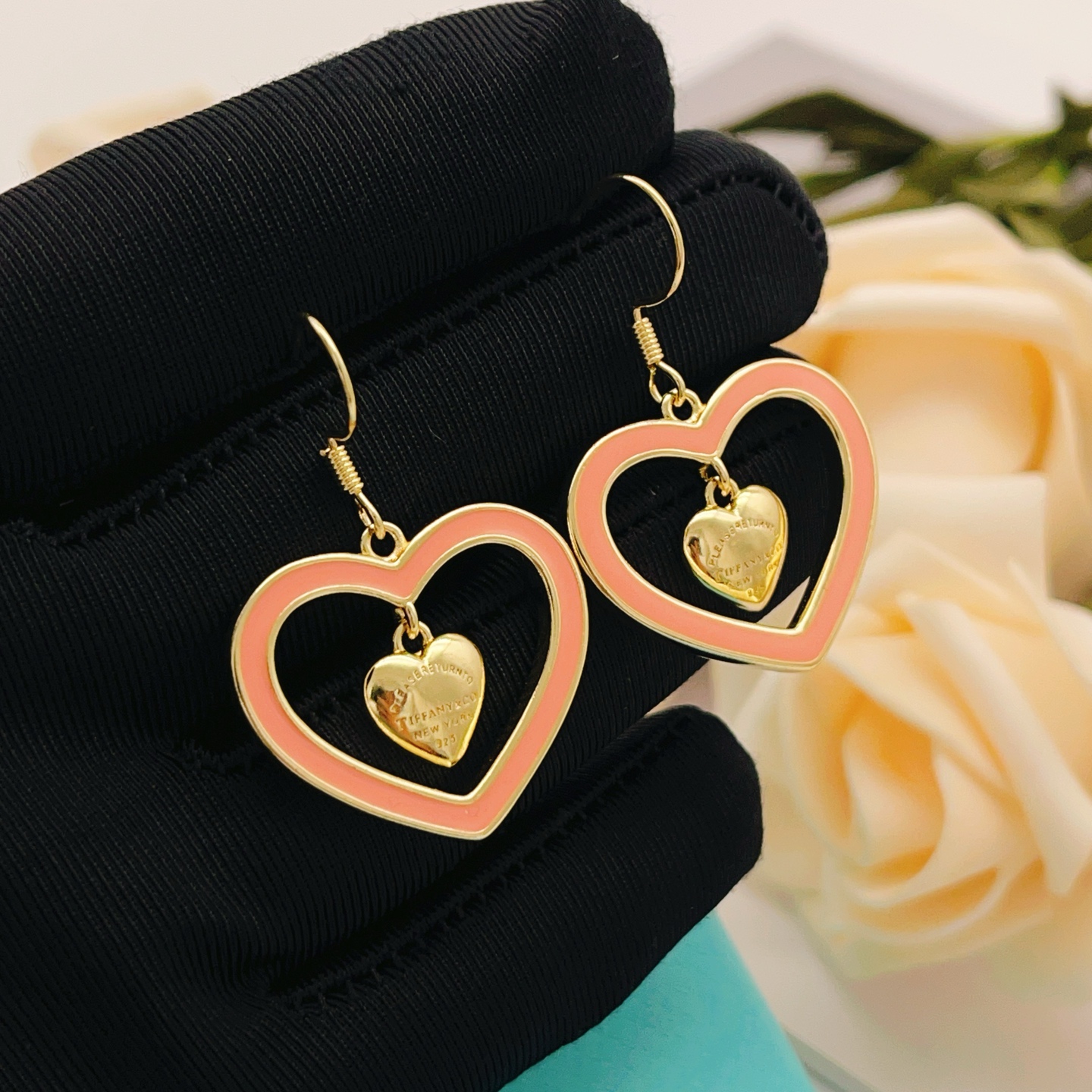 Tiffany Co Return to Tiffany Double Heart earrings gold-tone metal with coral pink enamel 3 5cm drop length
