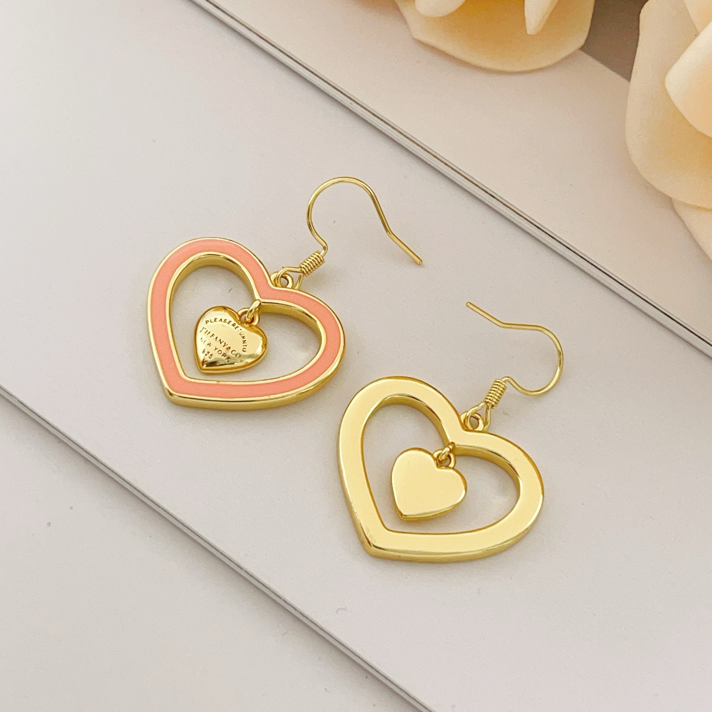 Tiffany Co Return to Tiffany Double Heart earrings gold-tone metal with coral pink enamel 3 5cm drop length