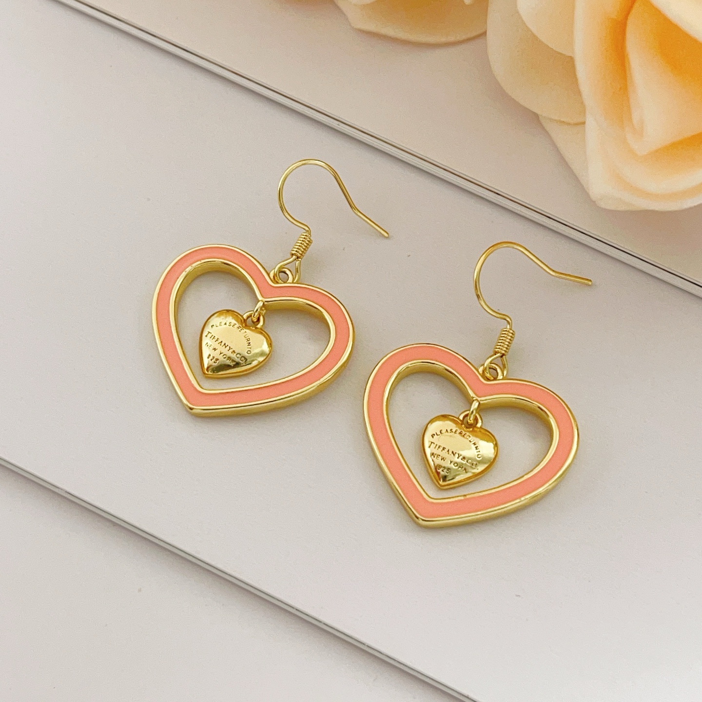 Tiffany Co Return to Tiffany Double Heart earrings gold-tone metal with coral pink enamel 3 5cm drop length