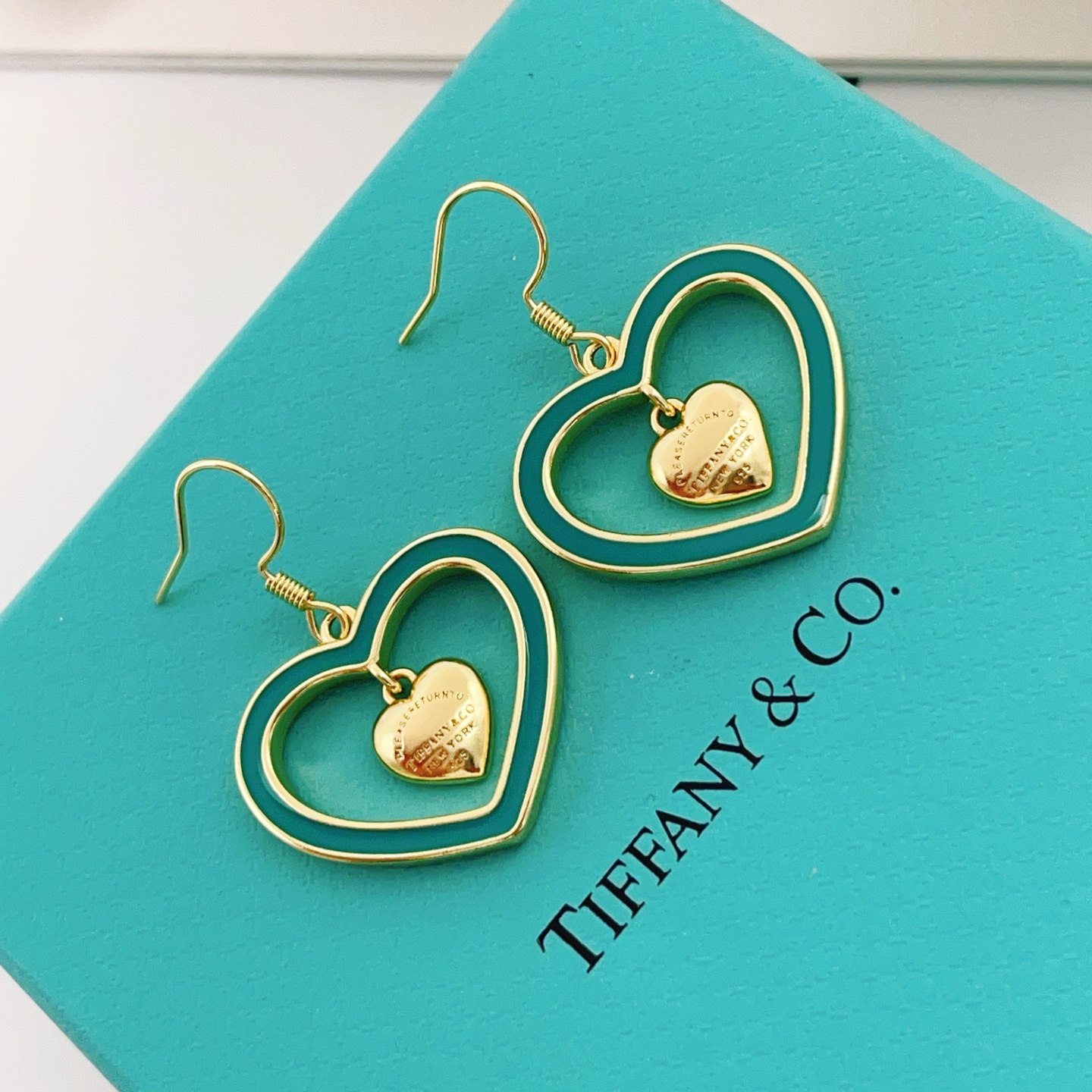 Tiffany Co Return to Tiffany Double Heart earrings gold-tone metal with teal enamel 3 5cm drop length