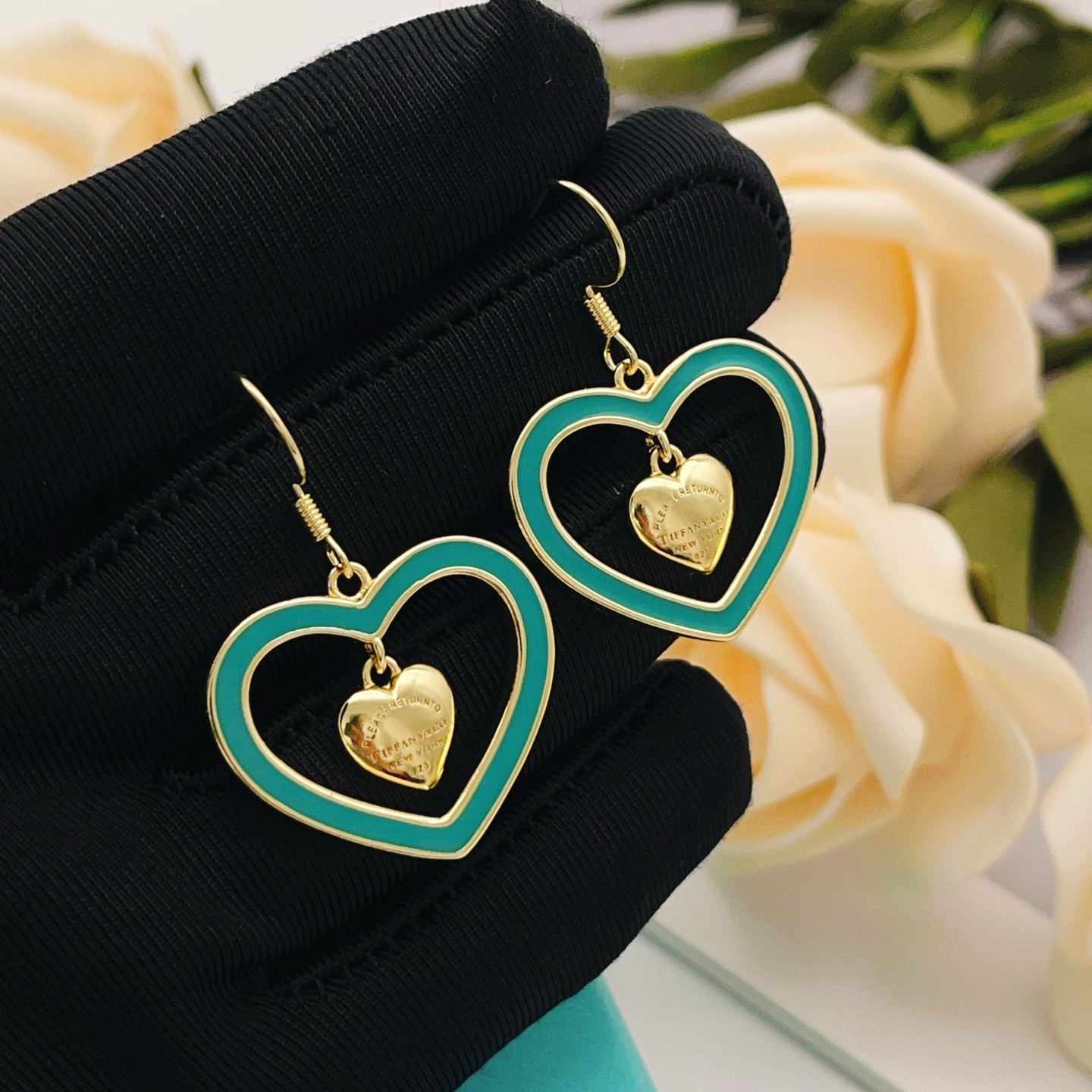 Tiffany Co Return to Tiffany Double Heart earrings gold-tone metal with teal enamel 3 5cm drop length
