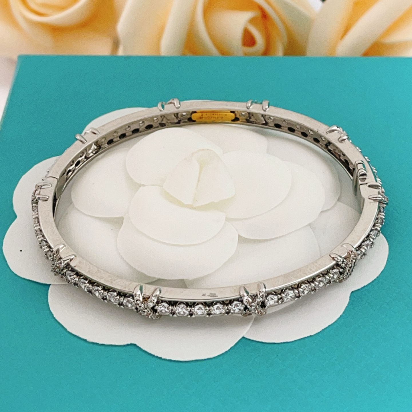 Tiffany Co Schlumberger X bracelet silver-toned white gold with clear diamond accents 17cm inner circumference