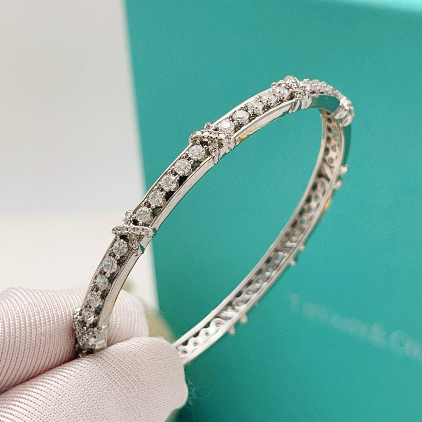 Tiffany Co Schlumberger X bracelet silver-toned white gold with clear diamond accents 17cm inner circumference
