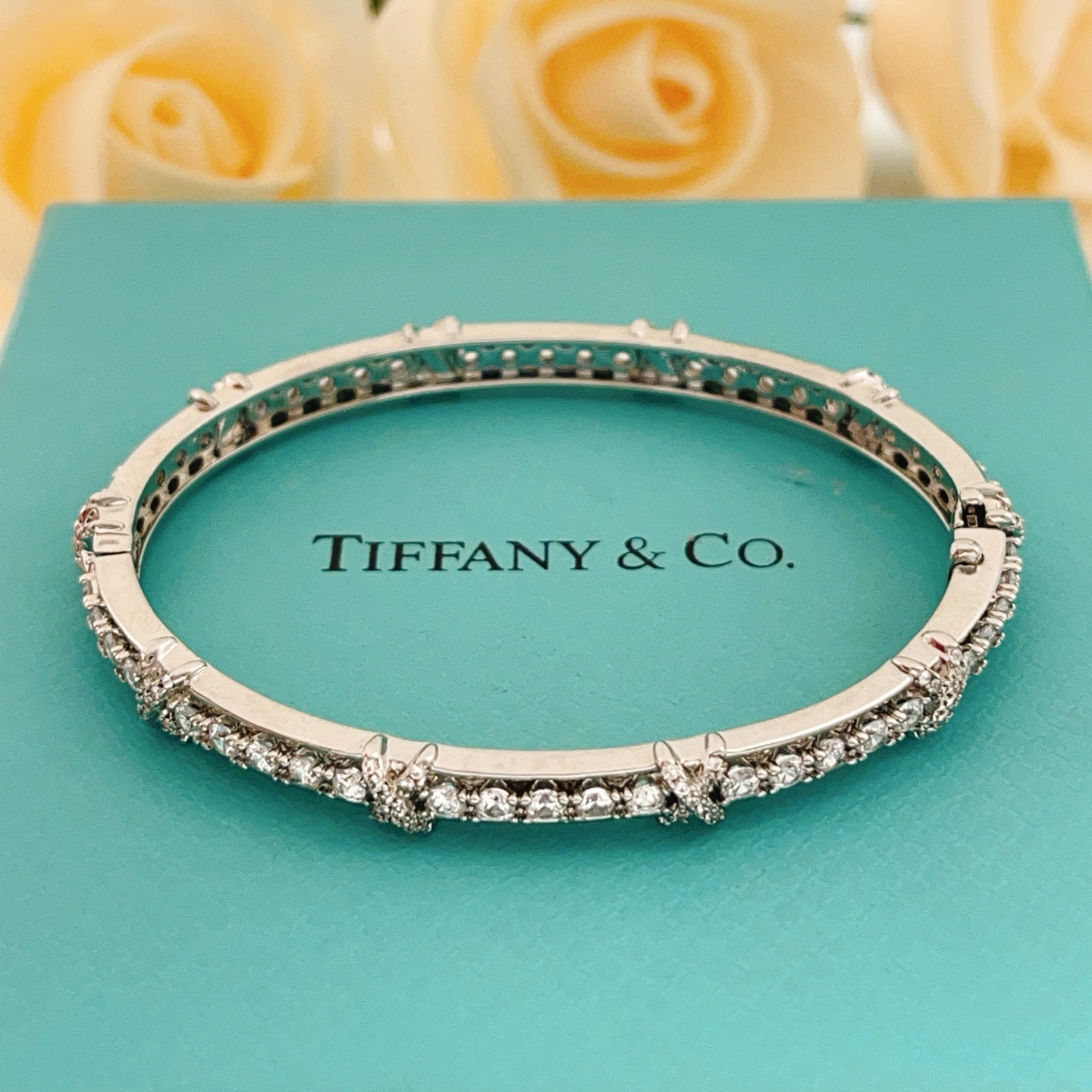 Tiffany Co Schlumberger X bracelet silver-toned white gold with clear diamond accents 17cm inner circumference
