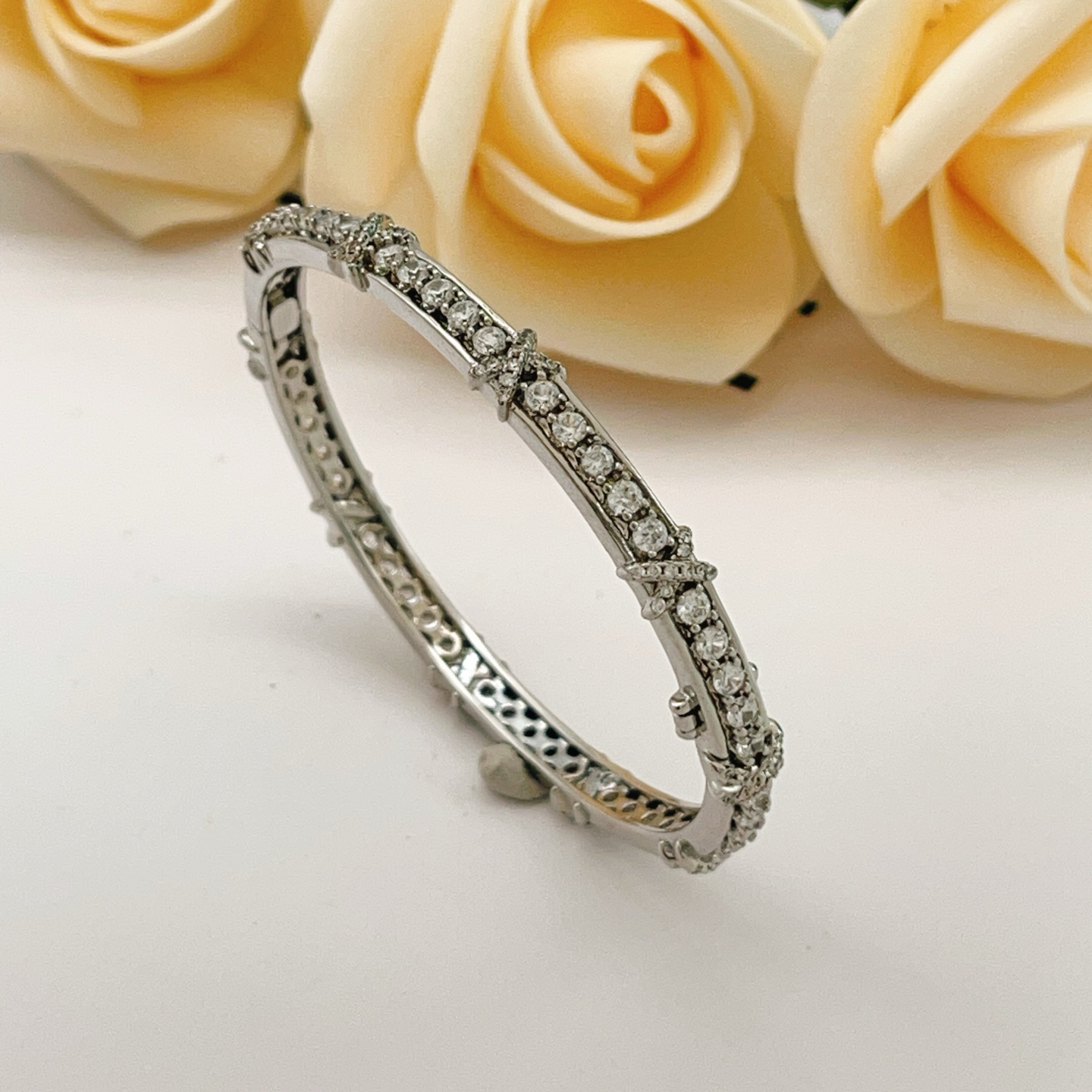 Tiffany Co Schlumberger X bracelet silver-toned white gold with clear diamond accents 17cm inner circumference