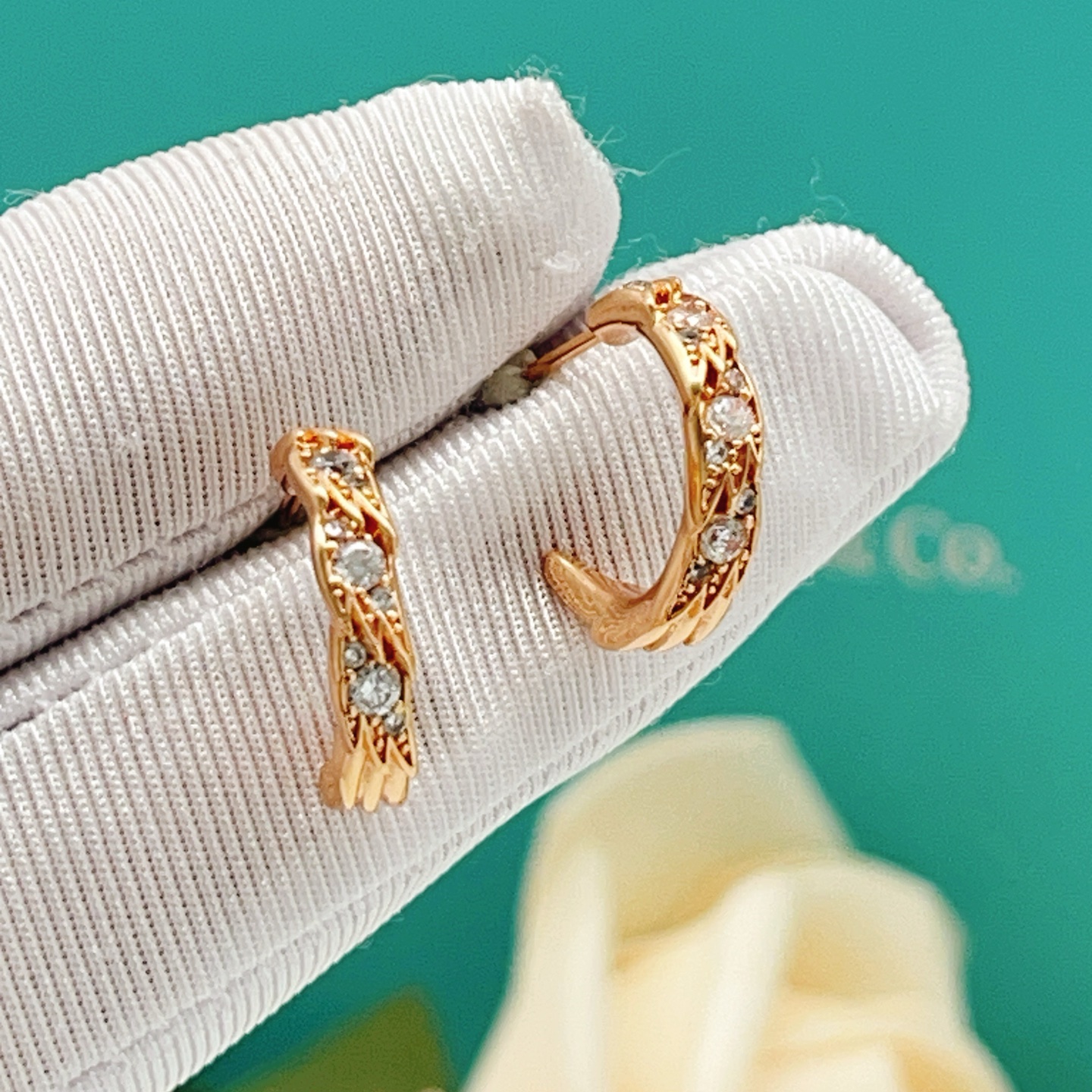 Tiffany Co Phoenix Tail Hoop Earrings earrings Gold-tone metal with clear round-cut cubic zirconia stones available in yellow gold rose gold and silver-tone metal finishes 15mm hoop diameter