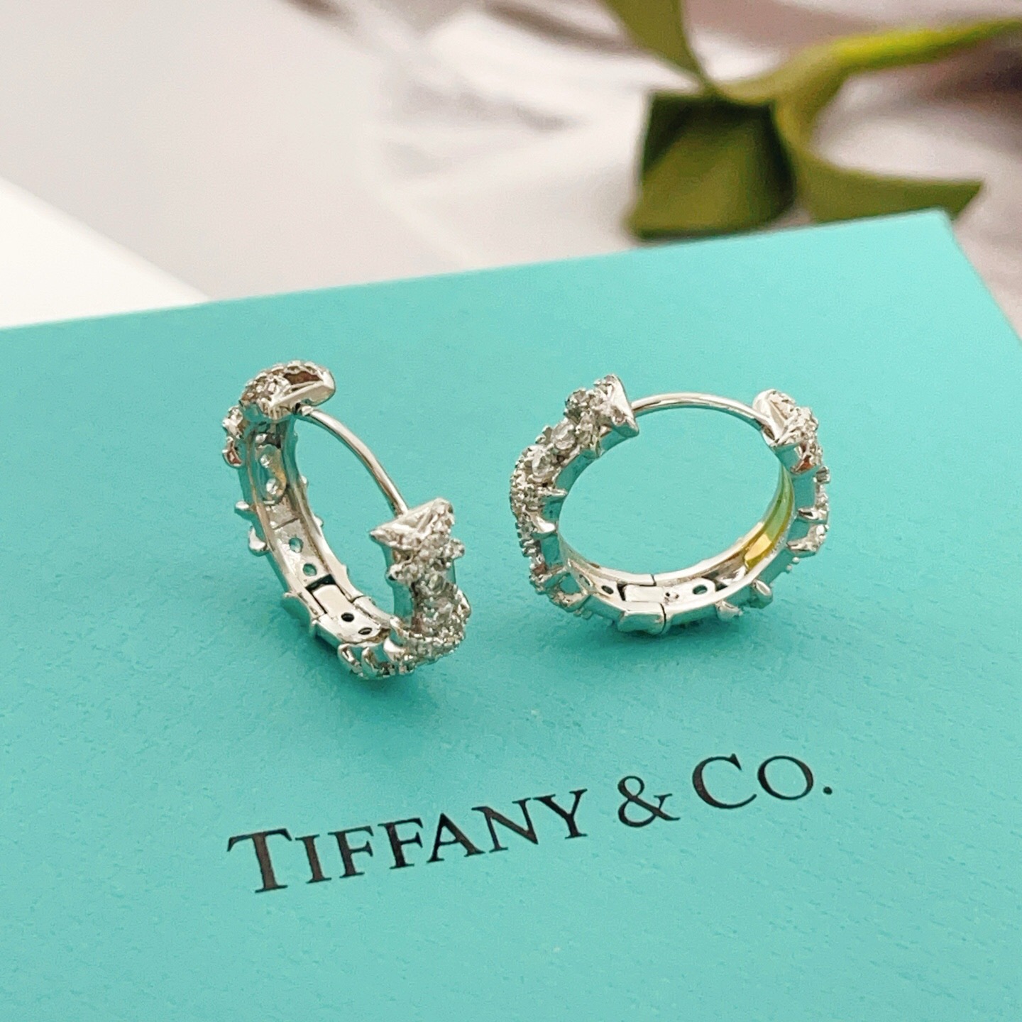Tiffany Co Sixteen Stone earrings silver-toned white gold with clear diamond accents 15mm hoop diameter