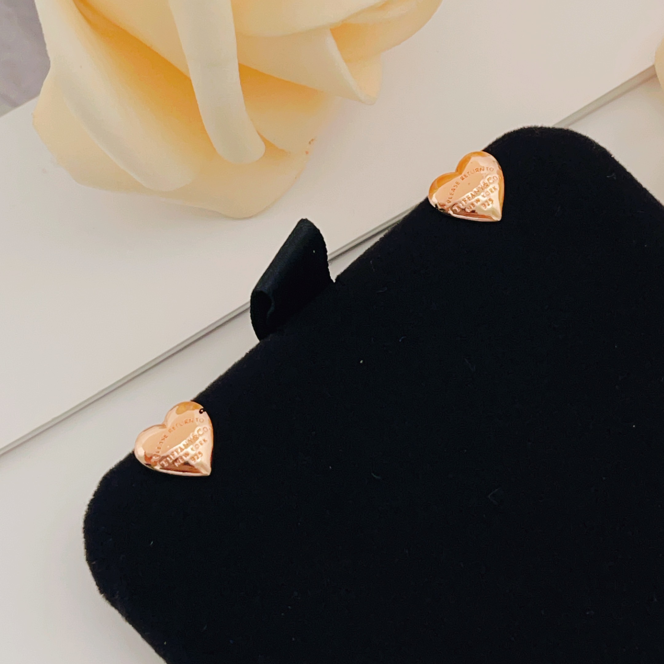 Tiffany Co Return to Tiffany Mini Heart earrings Rose gold-toned metal with engraved text detailing 8mm stud diameter
